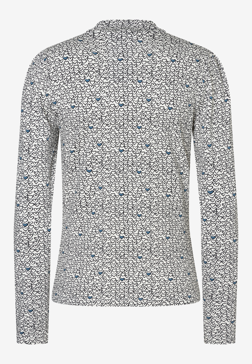 Ein weißes MORE & MORE Jersey-Oberteil mit schwarzen und blauen Herzen. Ein weißes MORE & MORE Jersey-Oberteil mit schwarzen und blauen Herzen.