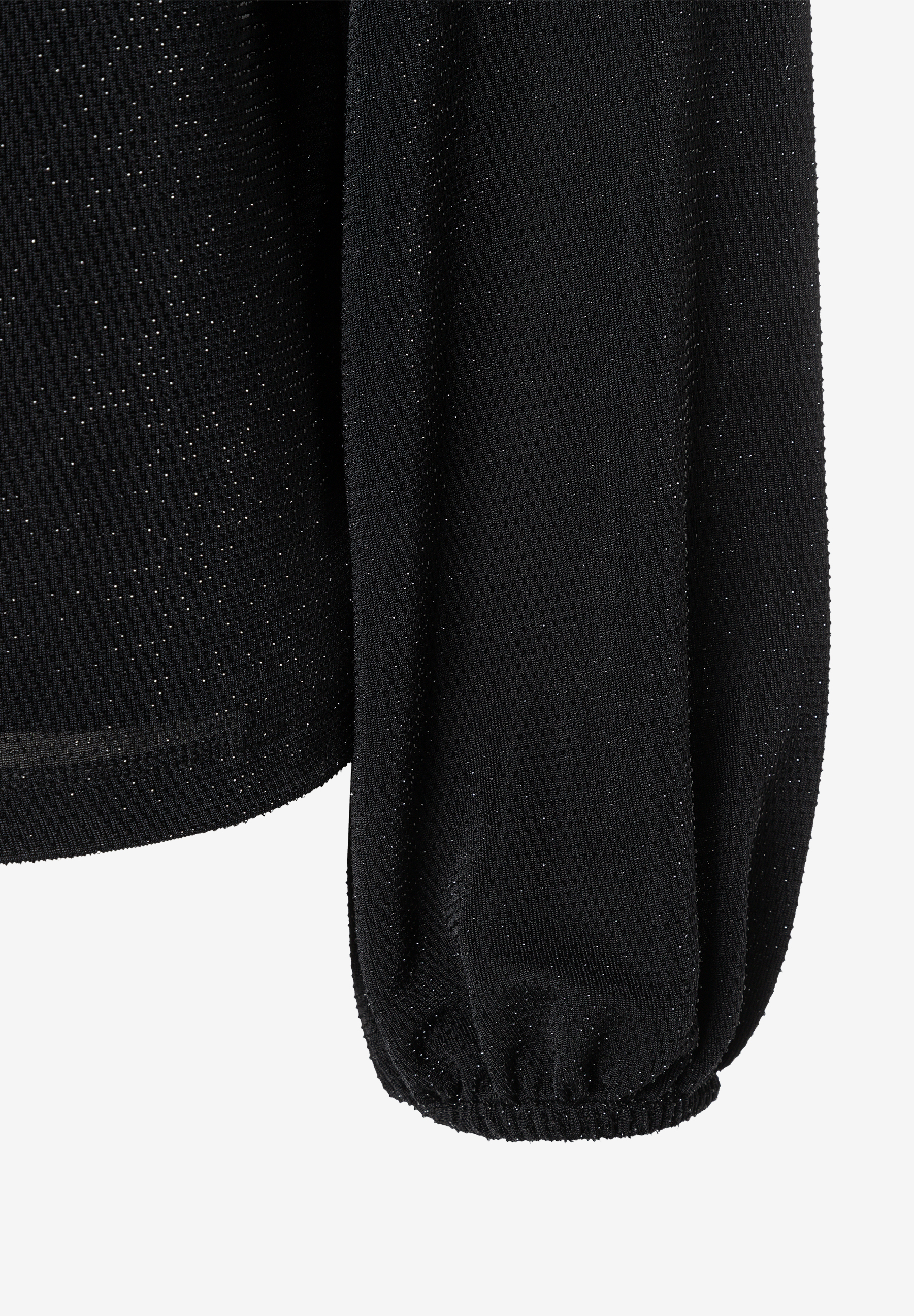 MORE & MORE Bluse in Schwarz mit glitzerndem Stoff, Puffärmeln und elastischen Bündchen. MORE & MORE Bluse in Schwarz mit glitzerndem Stoff, Puffärmeln und elastischen Bündchen.