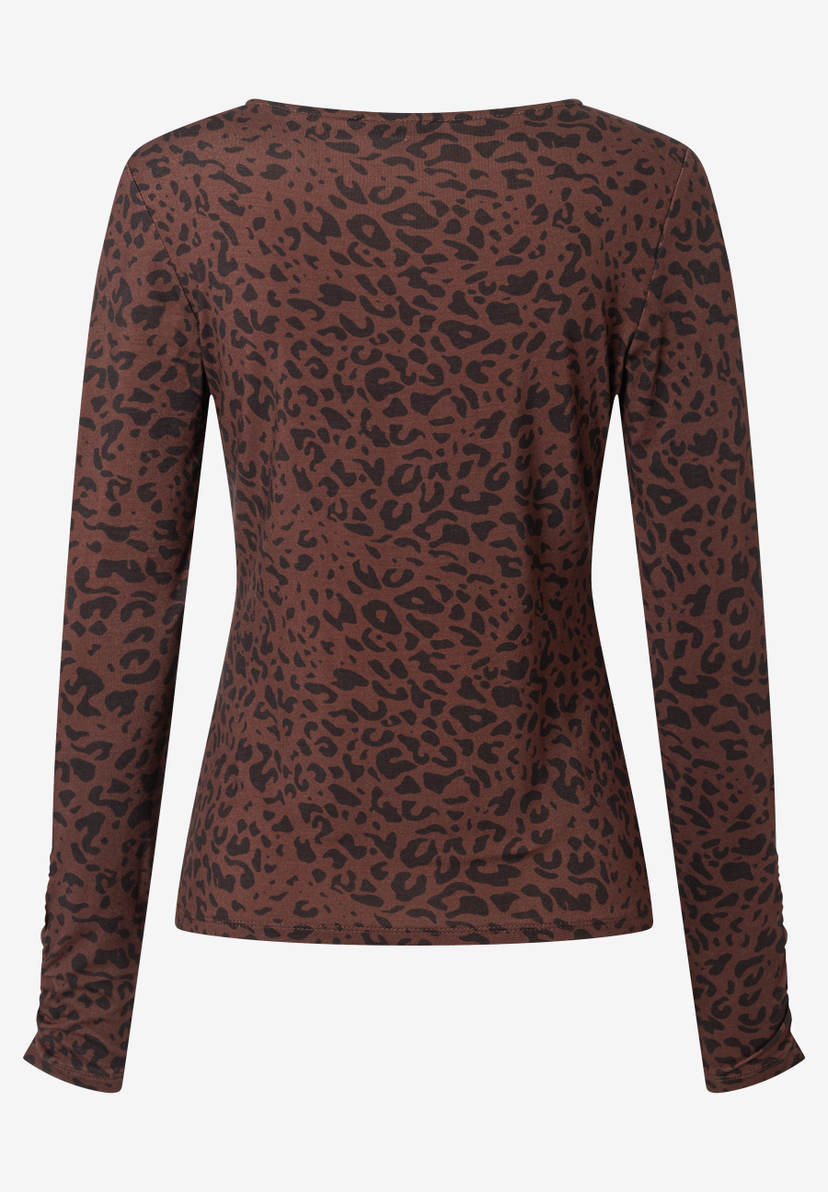MORE & MORE Langarmshirt aus Jersey mit braunem Leopardenmuster, elastisch und hautfreundlich. MORE & MORE Langarmshirt aus Jersey mit braunem Leopardenmuster, elastisch und hautfreundlich.