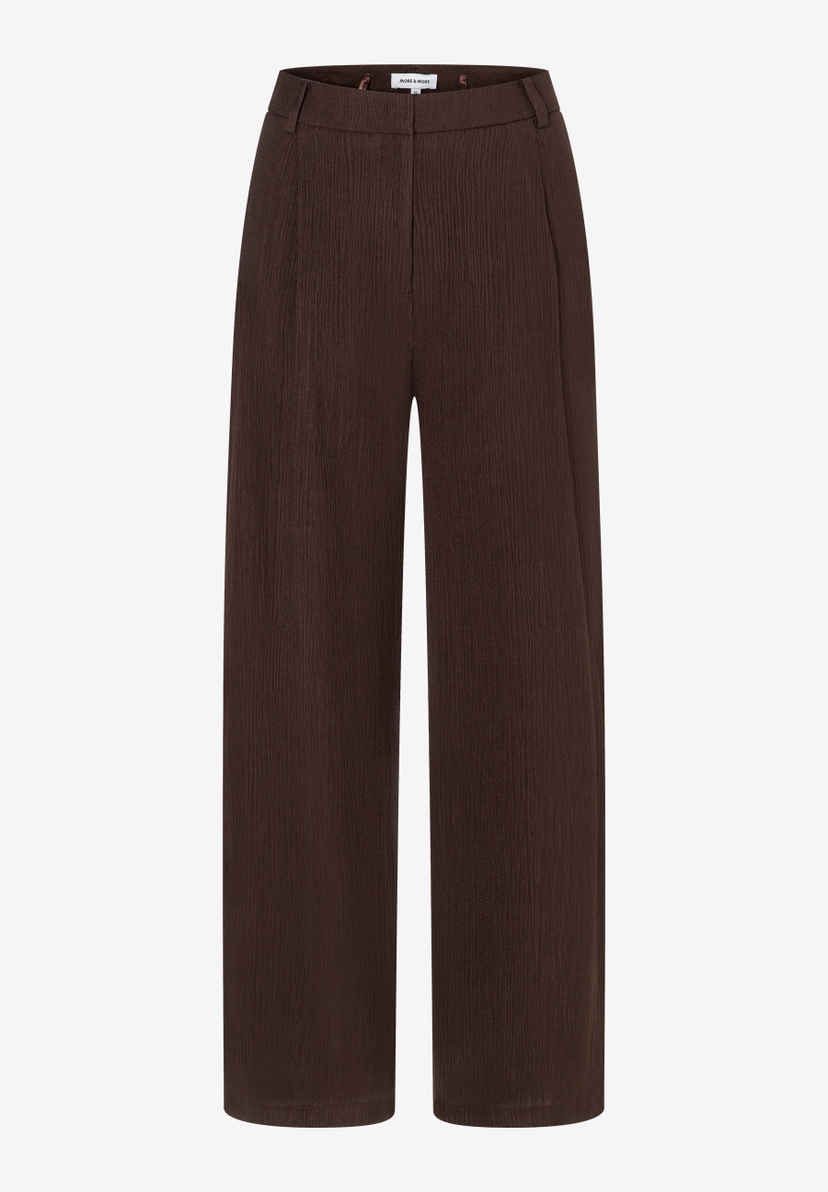 MORE & MORE Damenhose in Braun. Weite, fließende Hose aus leichtem Webstoff mit angenehmem Tragekomfort. MORE & MORE Damenhose in Braun. Weite, fließende Hose aus leichtem Webstoff mit angenehmem Tragekomfort.