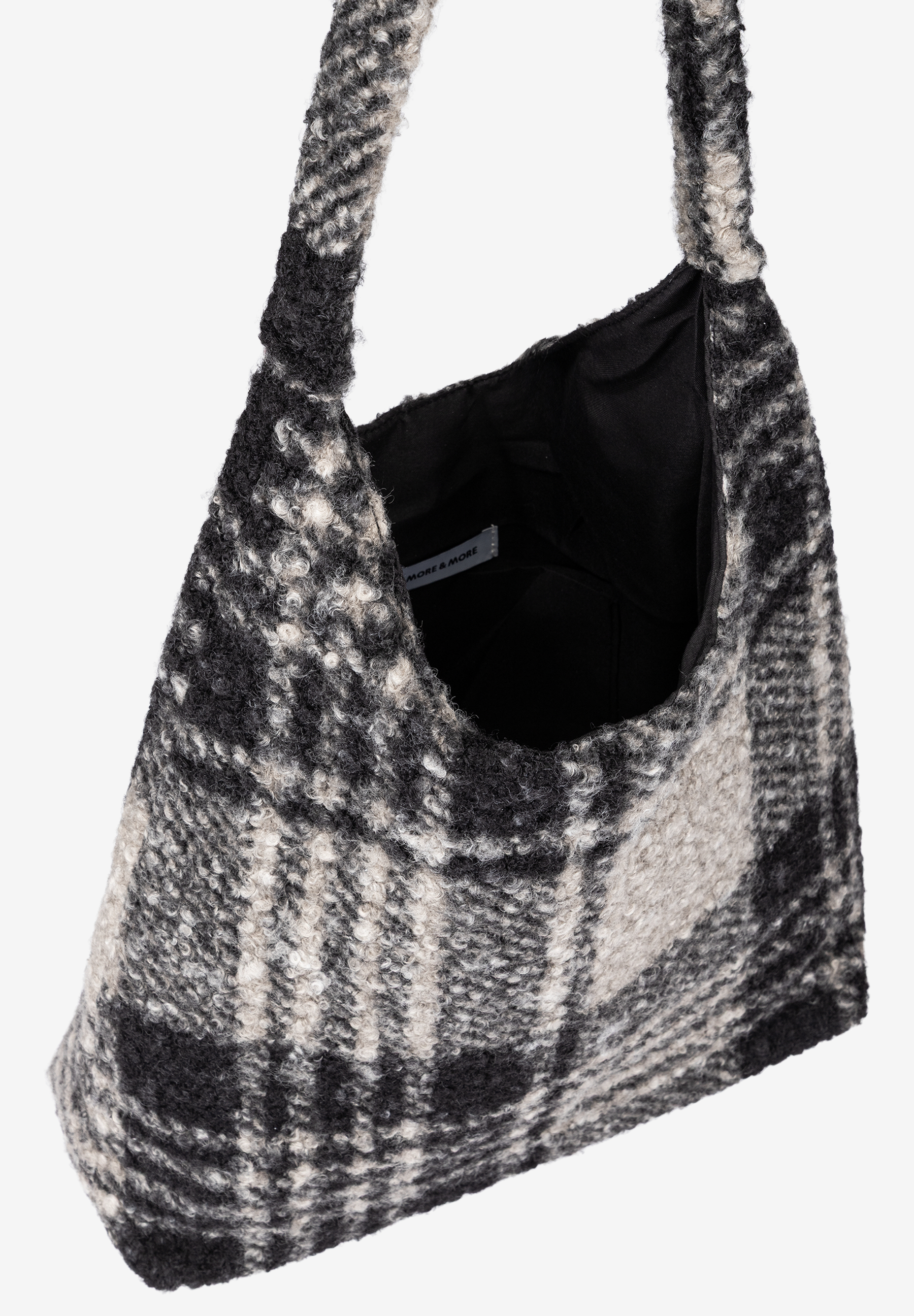 MORE & MORE Accessoire: Eine kuschelige Henkeltasche in Schwarz-Weiß mit Hahnentrittmuster und mehrfarbigem Innenfutter. MORE & MORE Accessoire: Eine kuschelige Henkeltasche in Schwarz-Weiß mit Hahnentrittmuster und mehrfarbigem Innenfutter.