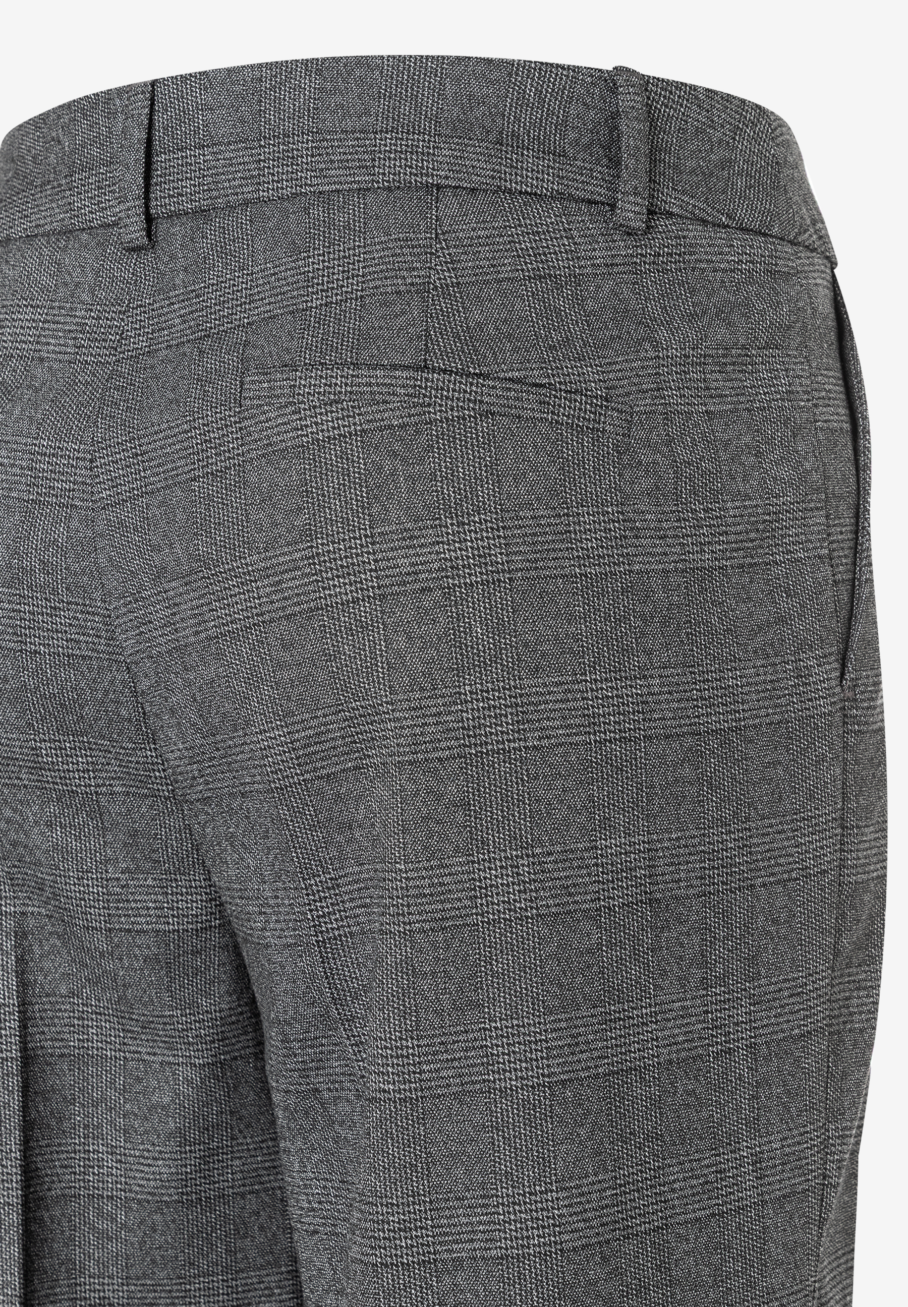 Detailaufnahme einer MORE & MORE Webware Hose/Jeans mit dezentem Karomuster und Gesäßtasche. Detailaufnahme einer MORE & MORE Webware Hose/Jeans mit dezentem Karomuster und Gesäßtasche.