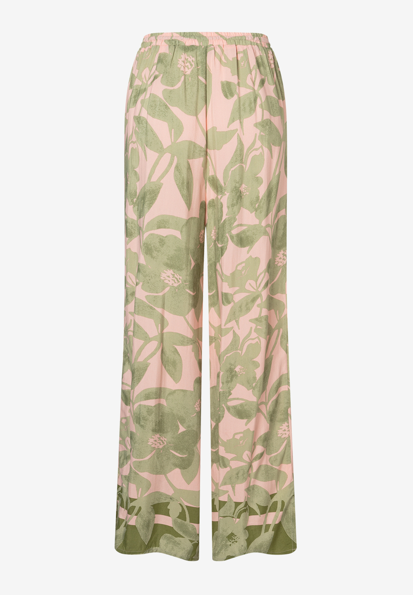 MORE & MORE Viskose-Jeans in Rosa mit fließendem, grüngemustertem Blumenmuster, elastischem Bund und weitem Bein. MORE & MORE Viskose-Jeans in Rosa mit fließendem, grüngemustertem Blumenmuster, elastischem Bund und weitem Bein.