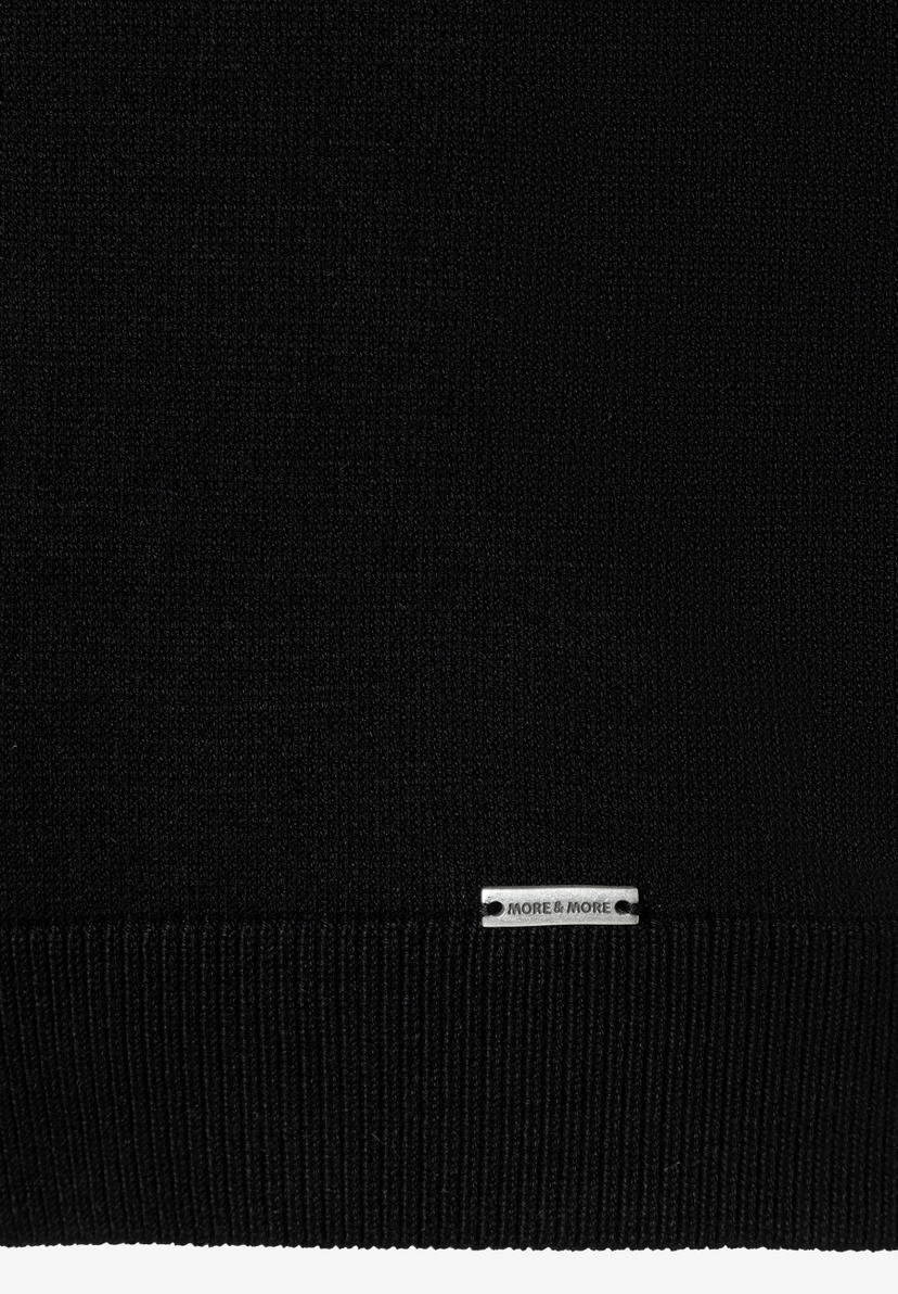 MORE & MORE schwarzer Pullover/Strickware mit geripptem Saum und kleiner silberner Logo-Plakette vorne MORE & MORE schwarzer Pullover/Strickware mit geripptem Saum und kleiner silberner Logo-Plakette vorne