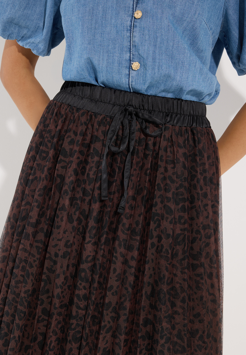 MORE & MORE Rock mit Leopardenmuster. Brauner Rock mit schwarzen Leopardenflecken, schwarzem Gummibund und schwarzer Schleife. MORE & MORE Rock mit Leopardenmuster. Brauner Rock mit schwarzen Leopardenflecken, schwarzem Gummibund und schwarzer Schleife.