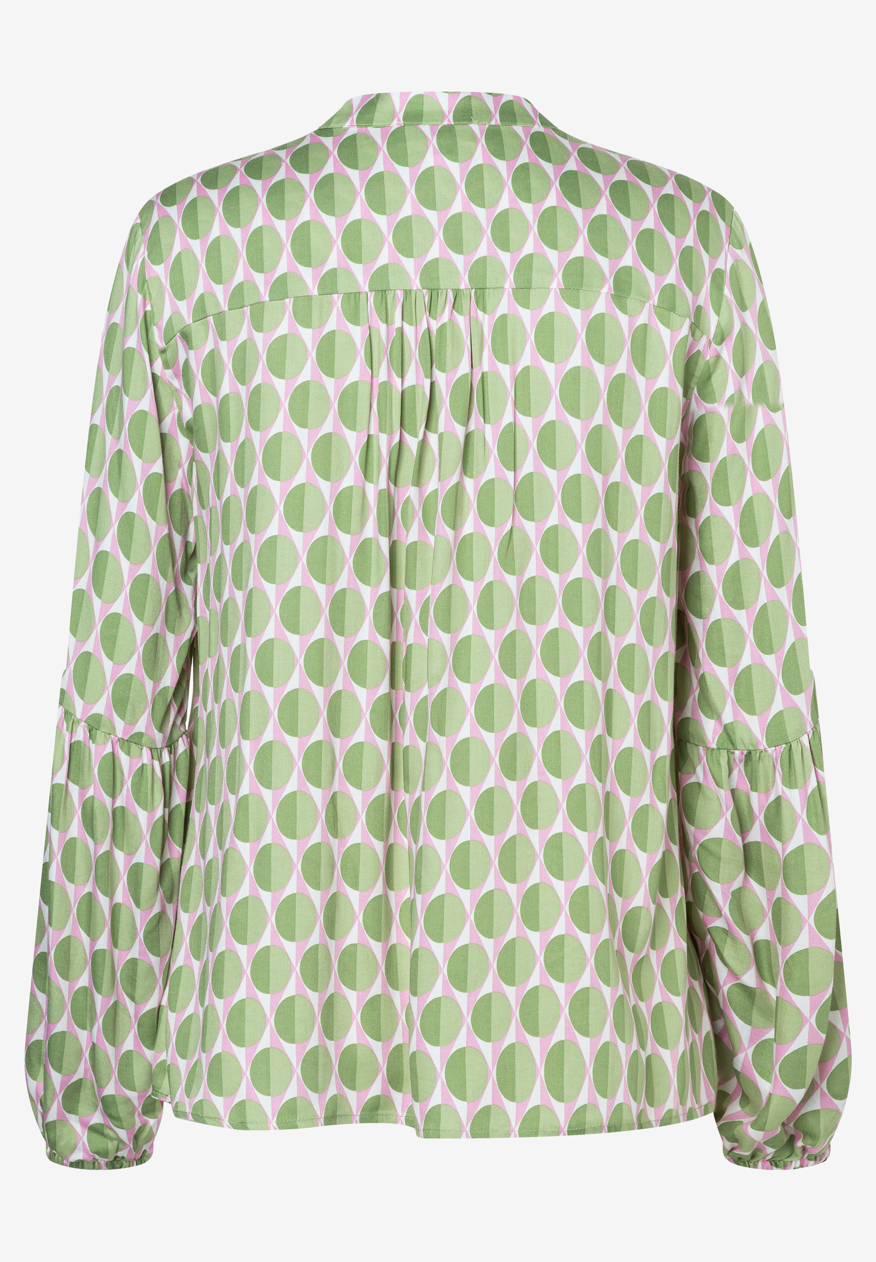 Eine MORE & MORE Bluse mit grün-rosa Punktmuster, langen Ärmeln und fließendem Viskose-Material. Eine MORE & MORE Bluse mit grün-rosa Punktmuster, langen Ärmeln und fließendem Viskose-Material.