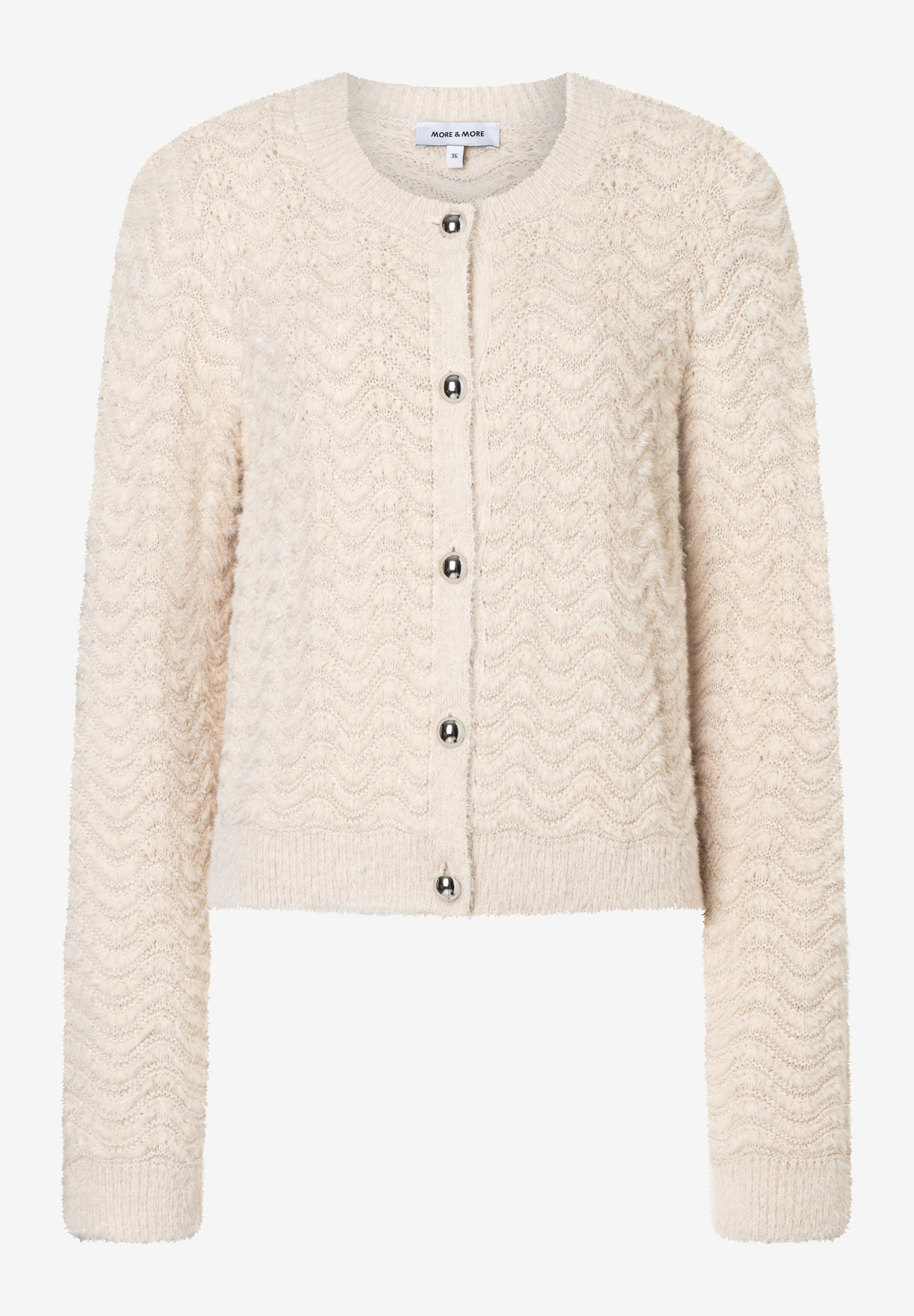 Ein beiger Cardigan mit Strukturstrick von MORE & MORE und silbernen Knöpfen. Ein beiger Cardigan mit Strukturstrick von MORE & MORE und silbernen Knöpfen.
