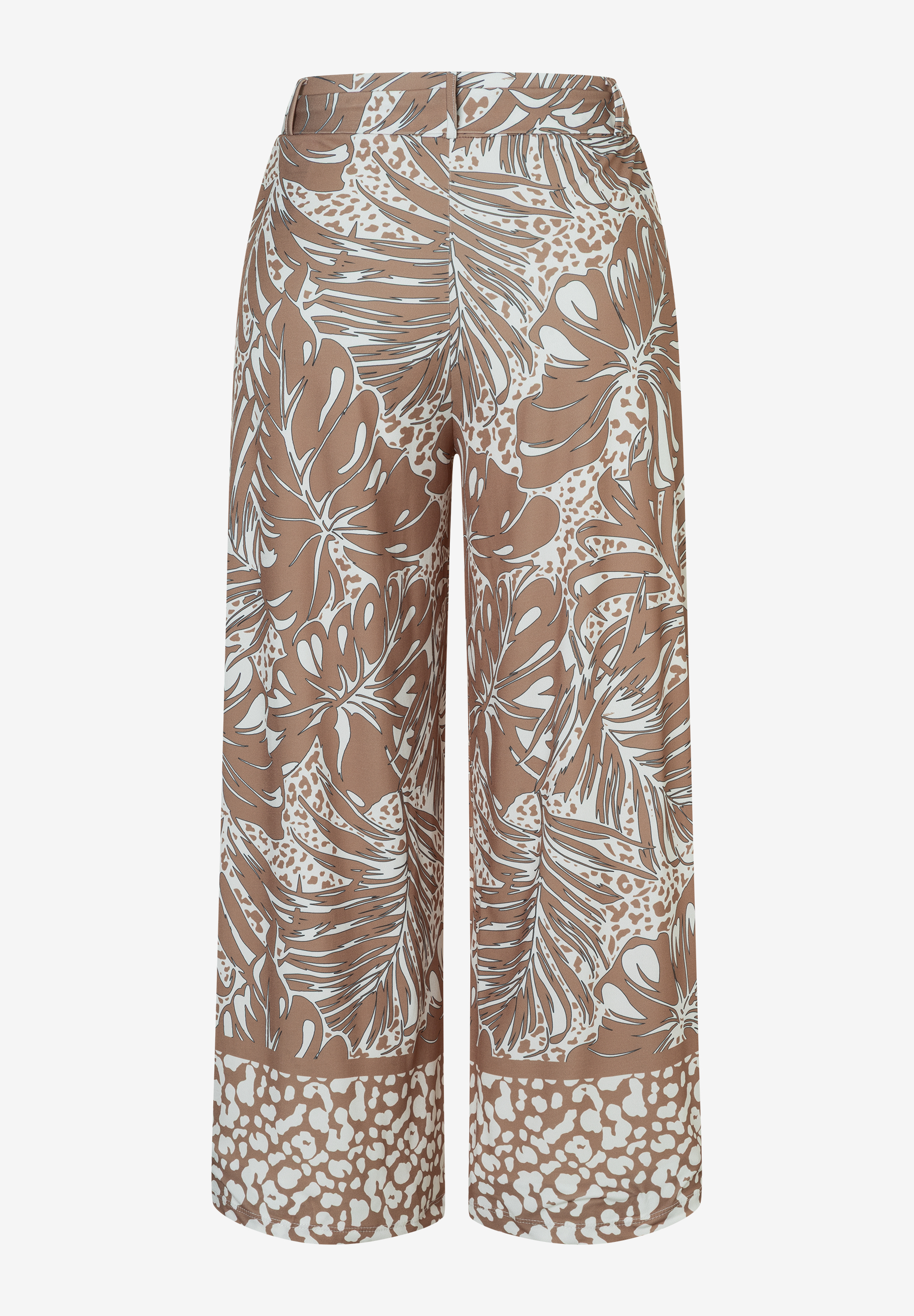 Eine MORE & MORE Jerseyhose mit braun-weißem Blattmuster und Leoprint am Beinabschluss. Eine MORE & MORE Jerseyhose mit braun-weißem Blattmuster und Leoprint am Beinabschluss.
