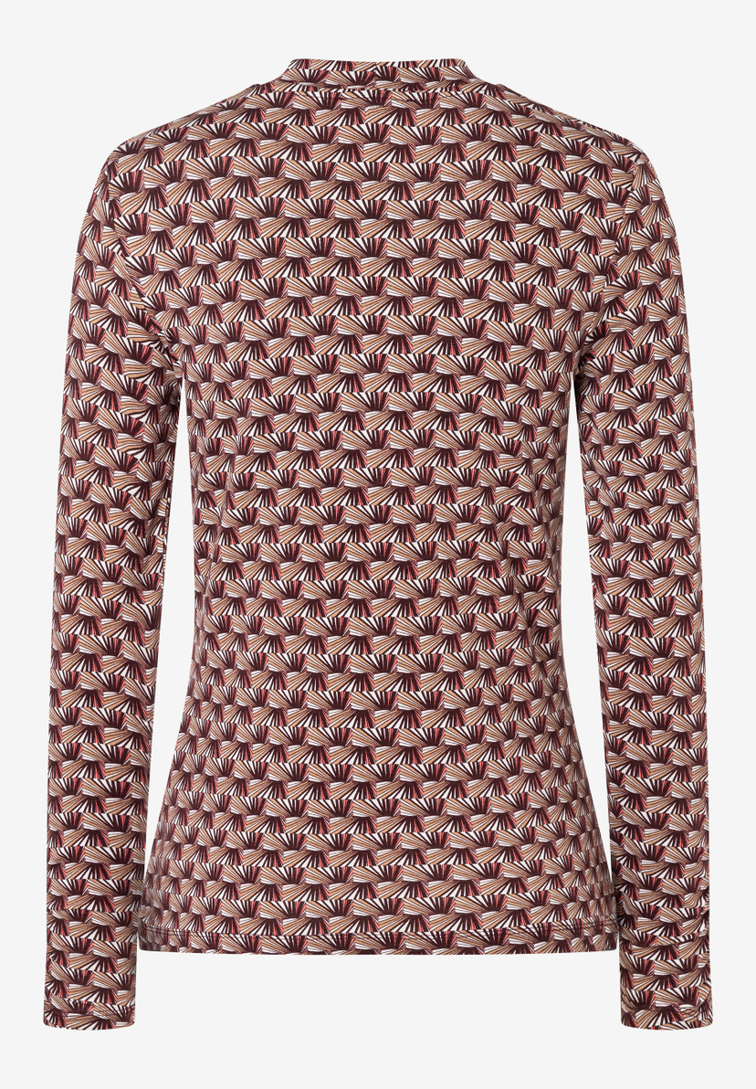 Ein MORE & MORE Oberteil mit einem grafischen Muster in Braun-, Rot- und Weißtönen. Lange Ärmel und ein hoher Kragen. Ein MORE & MORE Oberteil mit einem grafischen Muster in Braun-, Rot- und Weißtönen. Lange Ärmel und ein hoher Kragen.