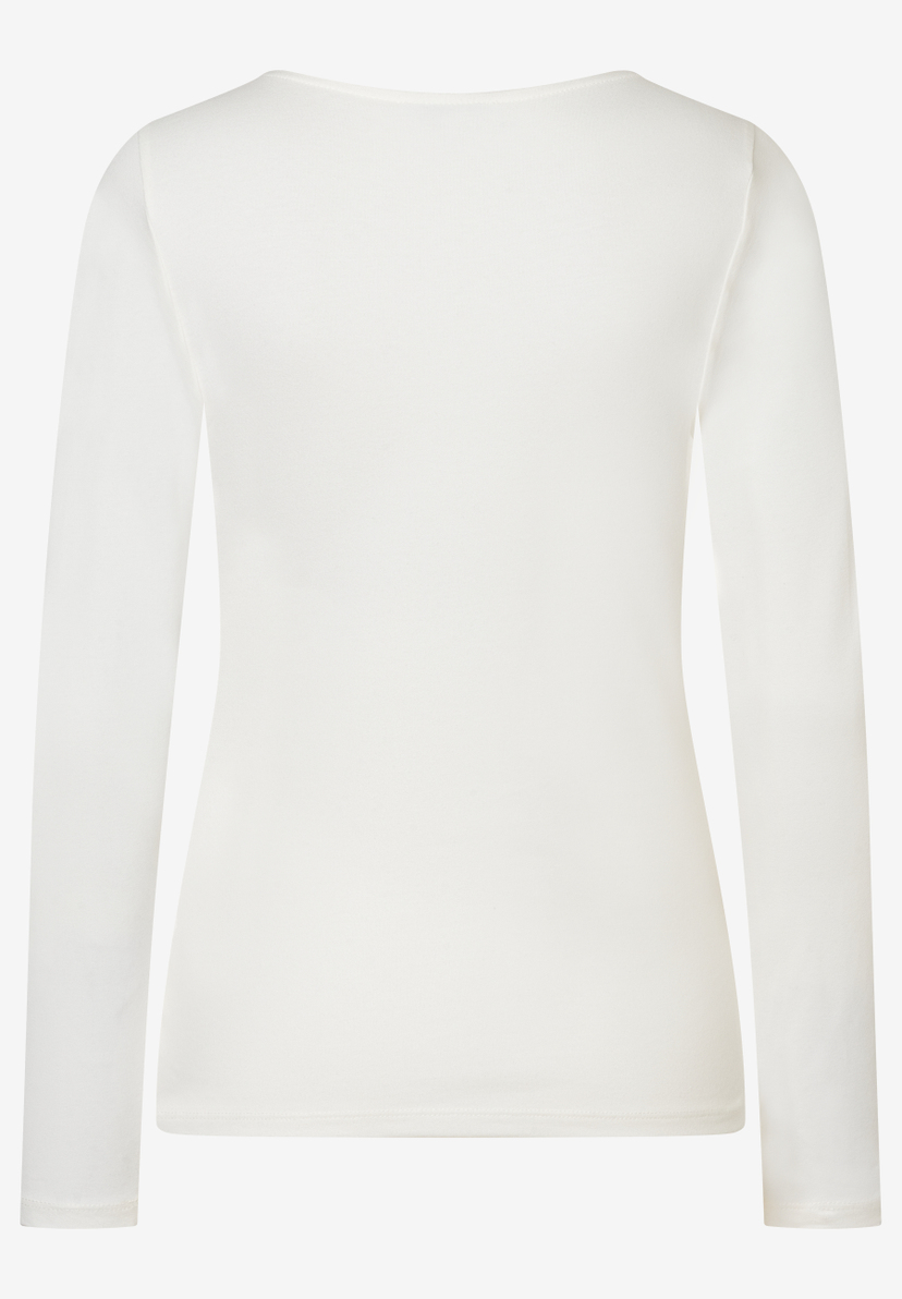 Ein weißes MORE & MORE Jersey-Oberteil mit langen Ärmeln, das für bequemen, elastischen Tragekomfort sorgt. Ein weißes MORE & MORE Jersey-Oberteil mit langen Ärmeln, das für bequemen, elastischen Tragekomfort sorgt.