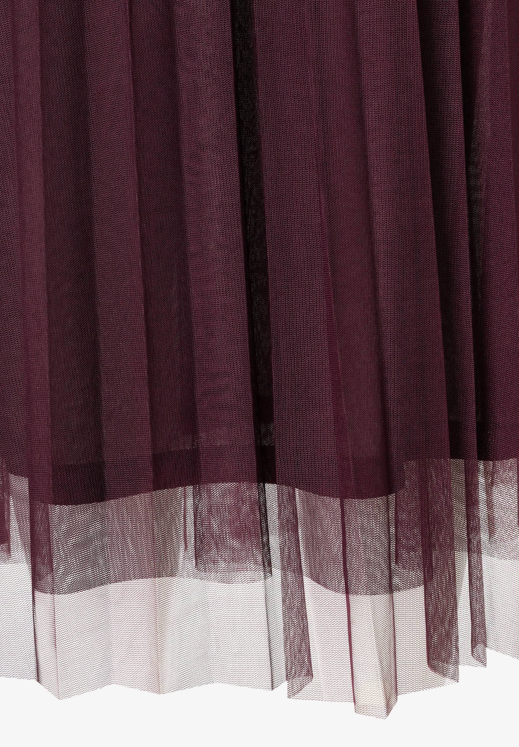 Nahaufnahme eines elastischen MORE & MORE Rockes aus Mesh-Material. Nahaufnahme eines elastischen MORE & MORE Rockes aus Mesh-Material.