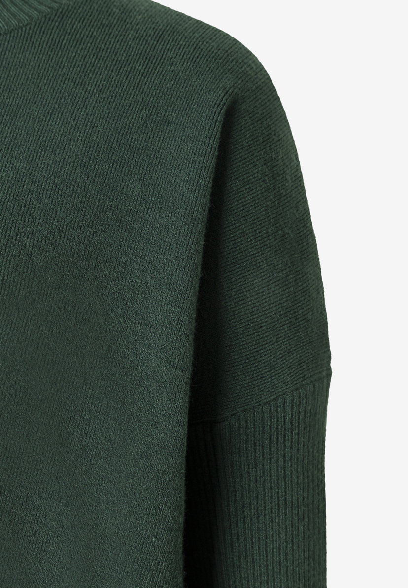 MORE & MORE Pullover in Dunkelgrün, gerippter Strick, Ärmel und Schulterpartie im Detail. MORE & MORE Pullover in Dunkelgrün, gerippter Strick, Ärmel und Schulterpartie im Detail.