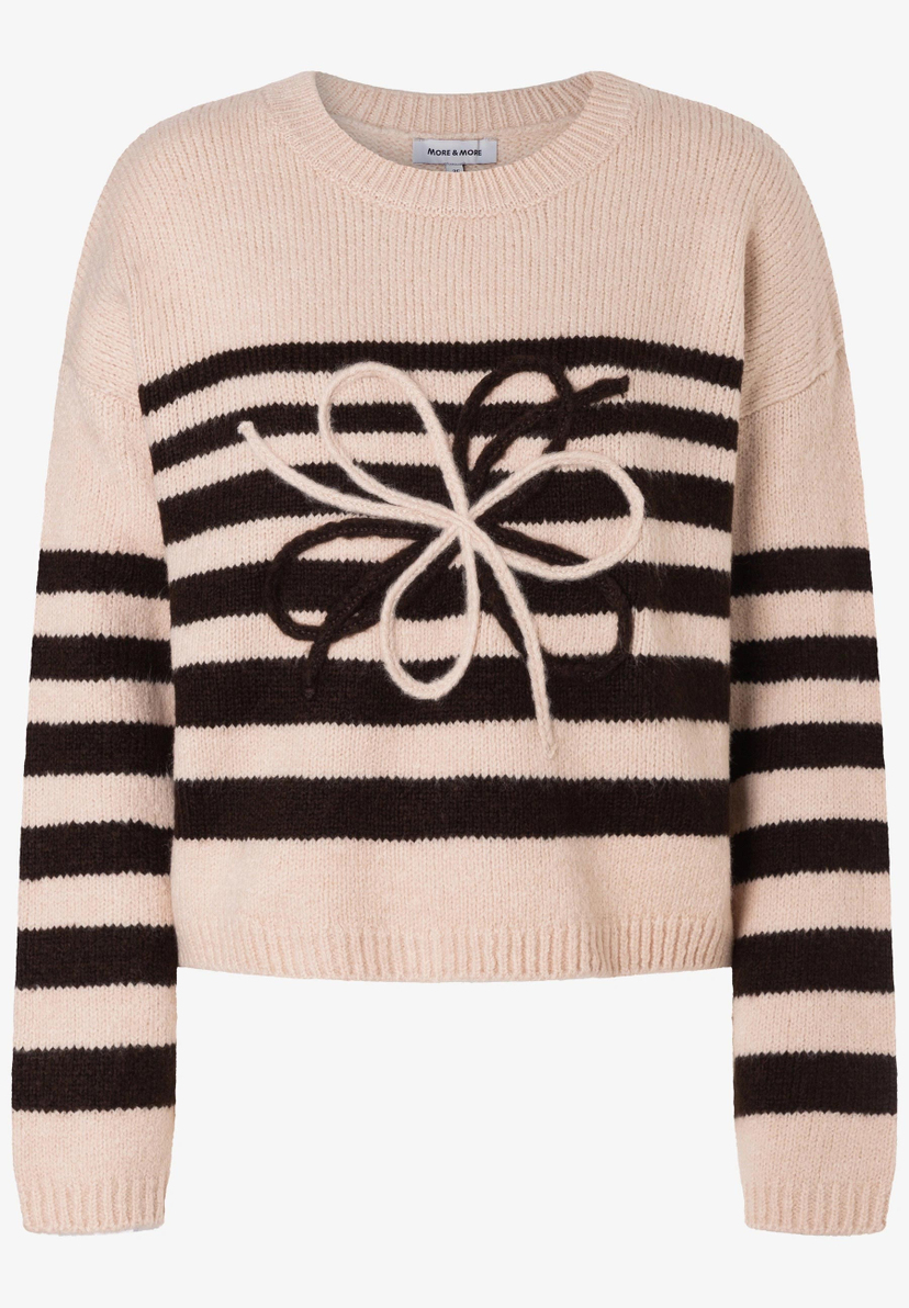 MORE & MORE Pullover in Beige mit braunen Streifen und einer stilisierten, bestickten Blüte in der Mitte. MORE & MORE Pullover in Beige mit braunen Streifen und einer stilisierten, bestickten Blüte in der Mitte.