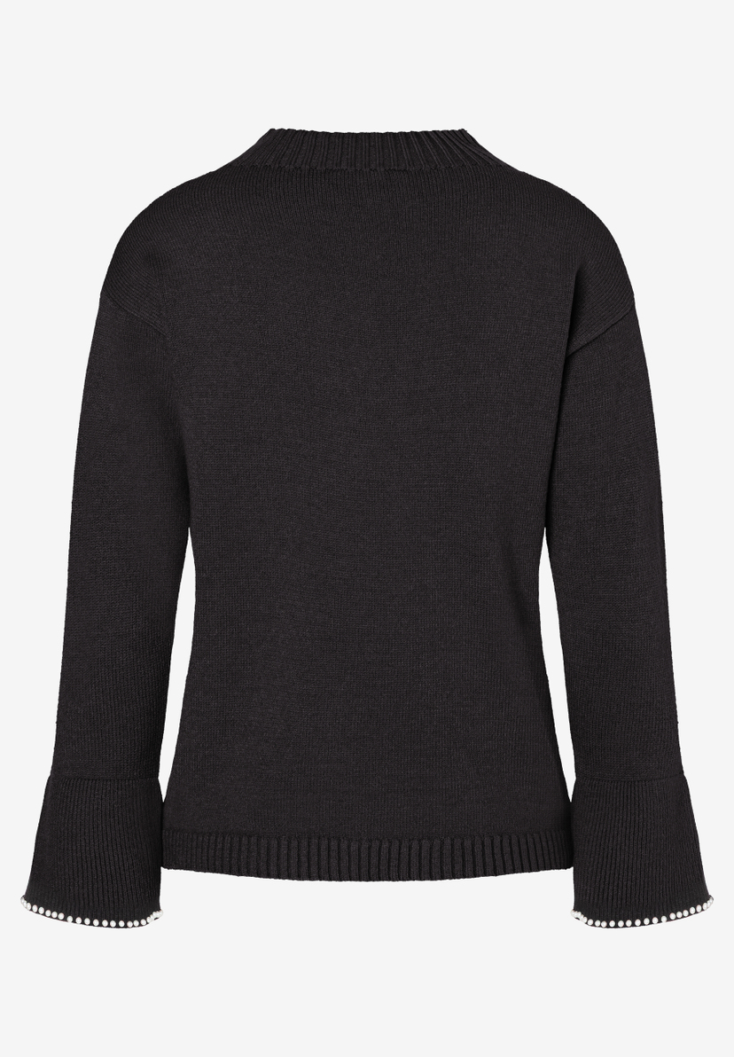 Ein schwarzer Strickpullover von MORE & MORE mit langen Ärmeln und Perlen am Saum. Ein schwarzer Strickpullover von MORE & MORE mit langen Ärmeln und Perlen am Saum.