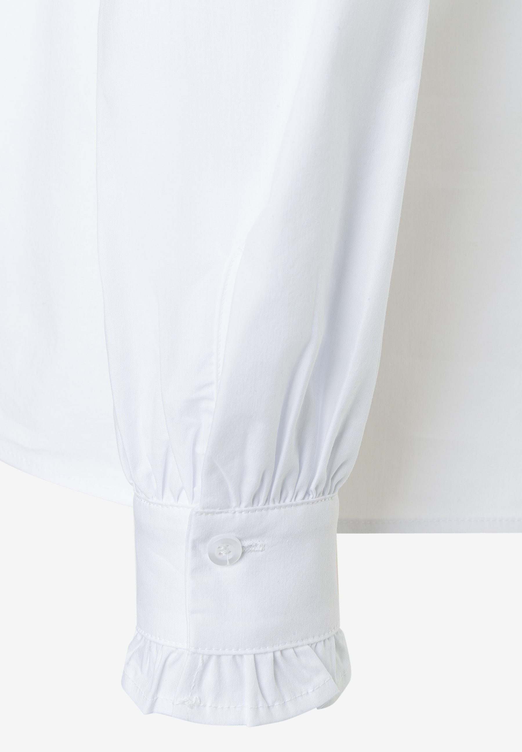 MORE & MORE Bluse: Detailaufnahme des Ärmelabschlusses mit Rüschen und Knopf MORE & MORE Bluse: Detailaufnahme des Ärmelabschlusses mit Rüschen und Knopf