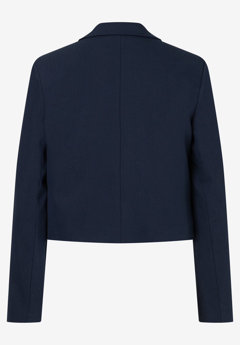 Die Rückansicht eines marineblauen Blazers von MORE & MORE aus Webware. Er bietet angenehmen Tragekomfort und ist elastisch. Die Rückansicht eines marineblauen Blazers von MORE & MORE aus Webware. Er bietet angenehmen Tragekomfort und ist elastisch.