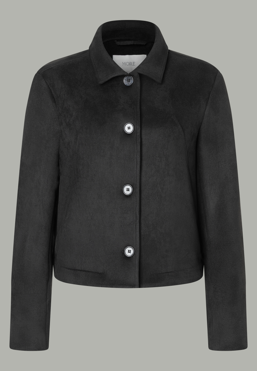 Ein schwarzer MORE & MORE Blazer mit Knöpfen in der Front. Ein schwarzer MORE & MORE Blazer mit Knöpfen in der Front.