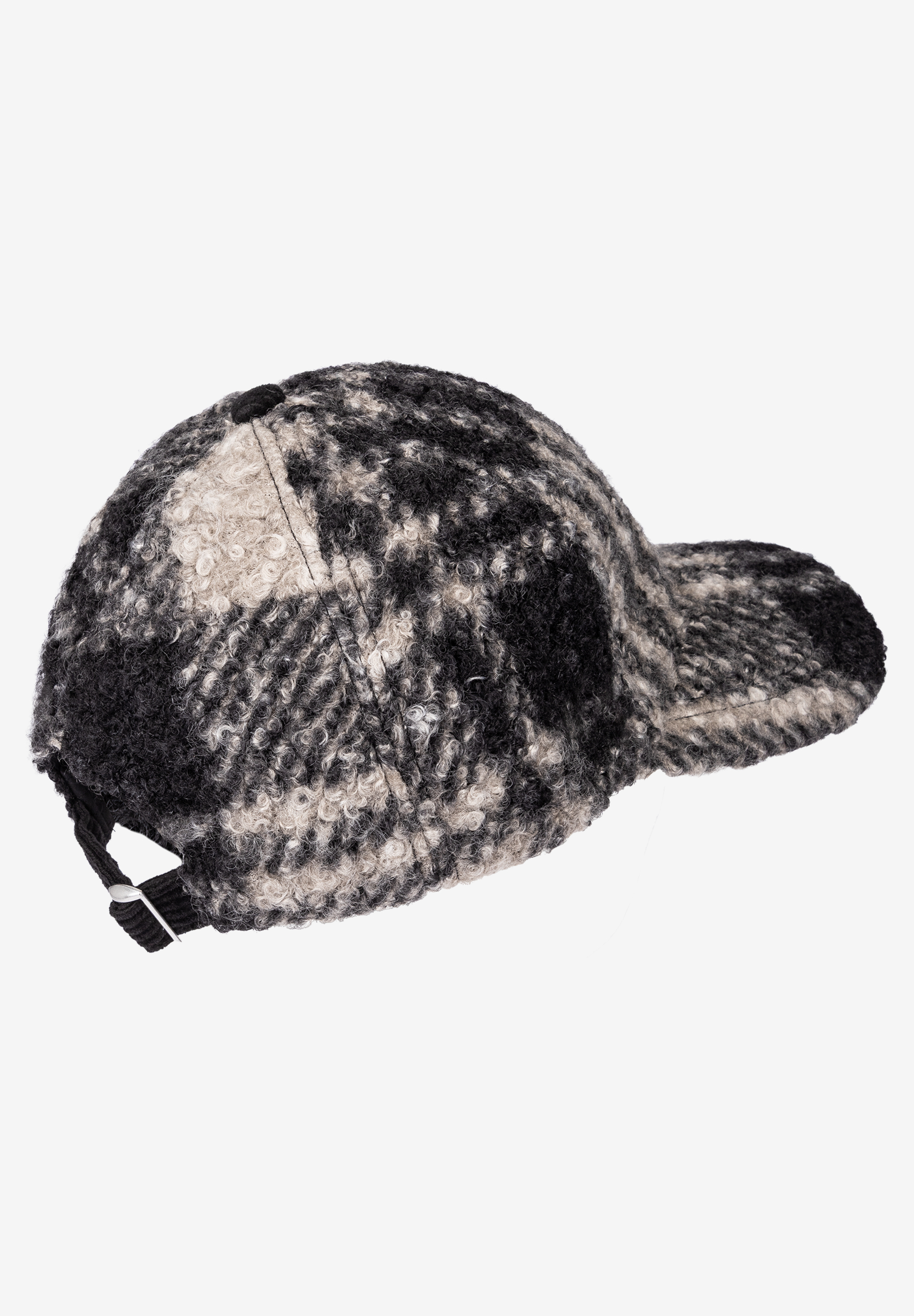 MORE & MORE Accessoire: Eine schwarz-weiß gemusterte Baseballkappe aus Bouclé-Stoff, Ansicht von der Seite. MORE & MORE Accessoire: Eine schwarz-weiß gemusterte Baseballkappe aus Bouclé-Stoff, Ansicht von der Seite.