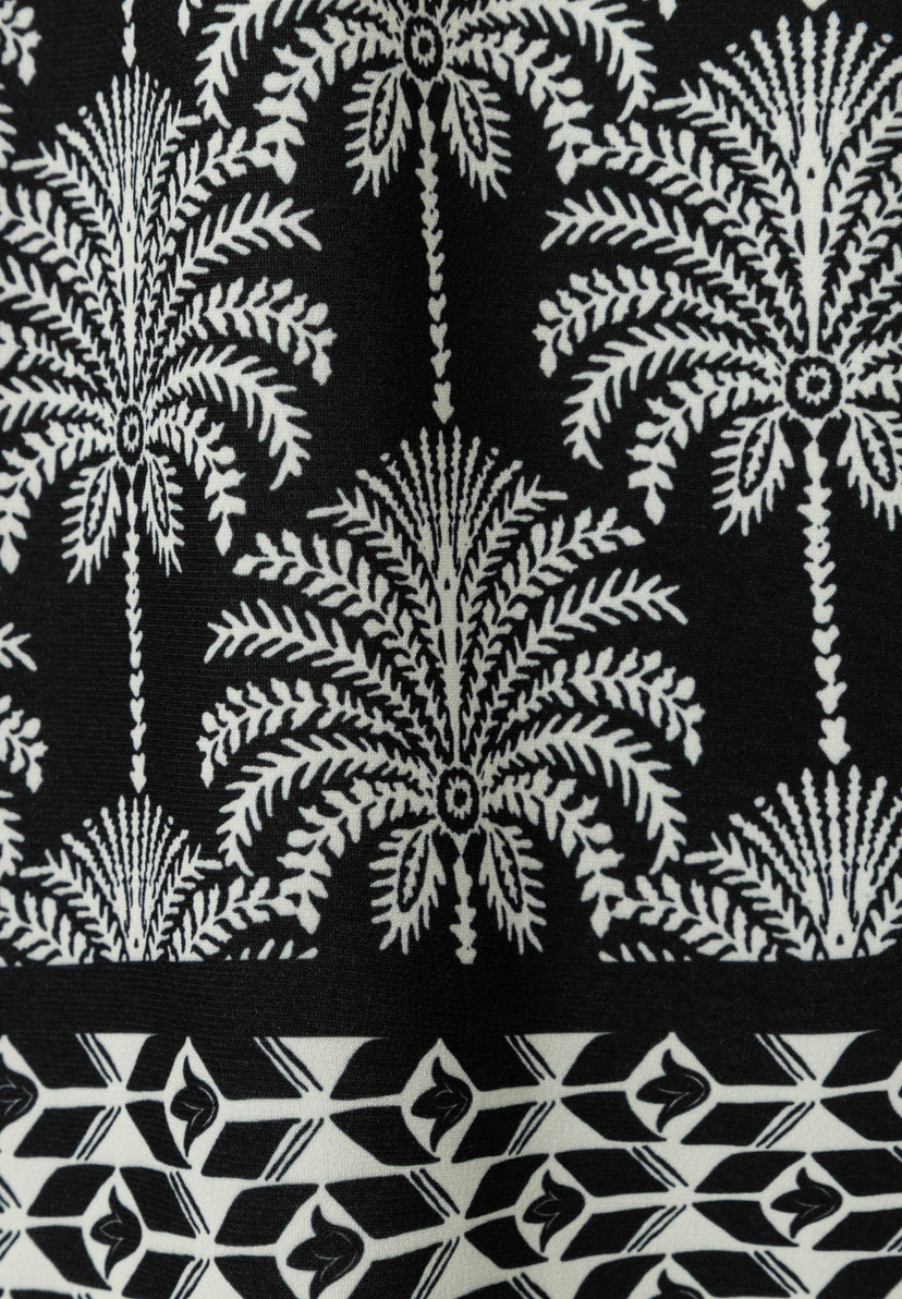 MORE & MORE Jersey-Jeans mit schwarz-weißem Palmen- und geometrischem Muster, knitterarm und fließend. MORE & MORE Jersey-Jeans mit schwarz-weißem Palmen- und geometrischem Muster, knitterarm und fließend.