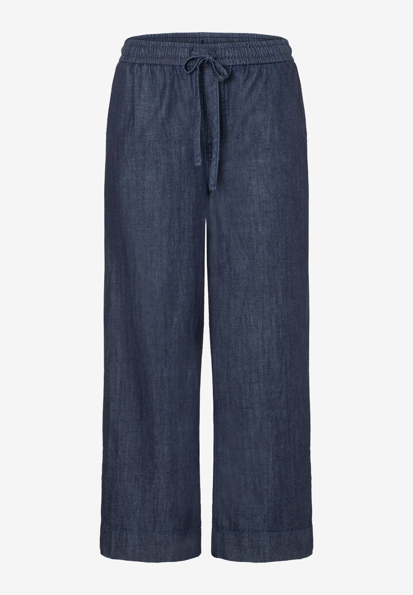 Eine Jeanshose von MORE & MORE aus Denim mit Tunnelzug und weitem Bein. Eine Jeanshose von MORE & MORE aus Denim mit Tunnelzug und weitem Bein.