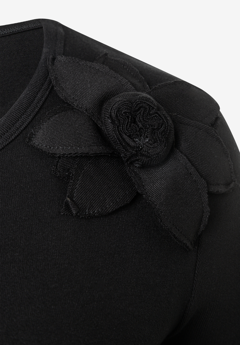 MORE & MORE Damen-T-Shirt-Top, schwarzer Stoff mit gerollter Stoffblume an der Schulter. MORE & MORE Damen-T-Shirt-Top, schwarzer Stoff mit gerollter Stoffblume an der Schulter.