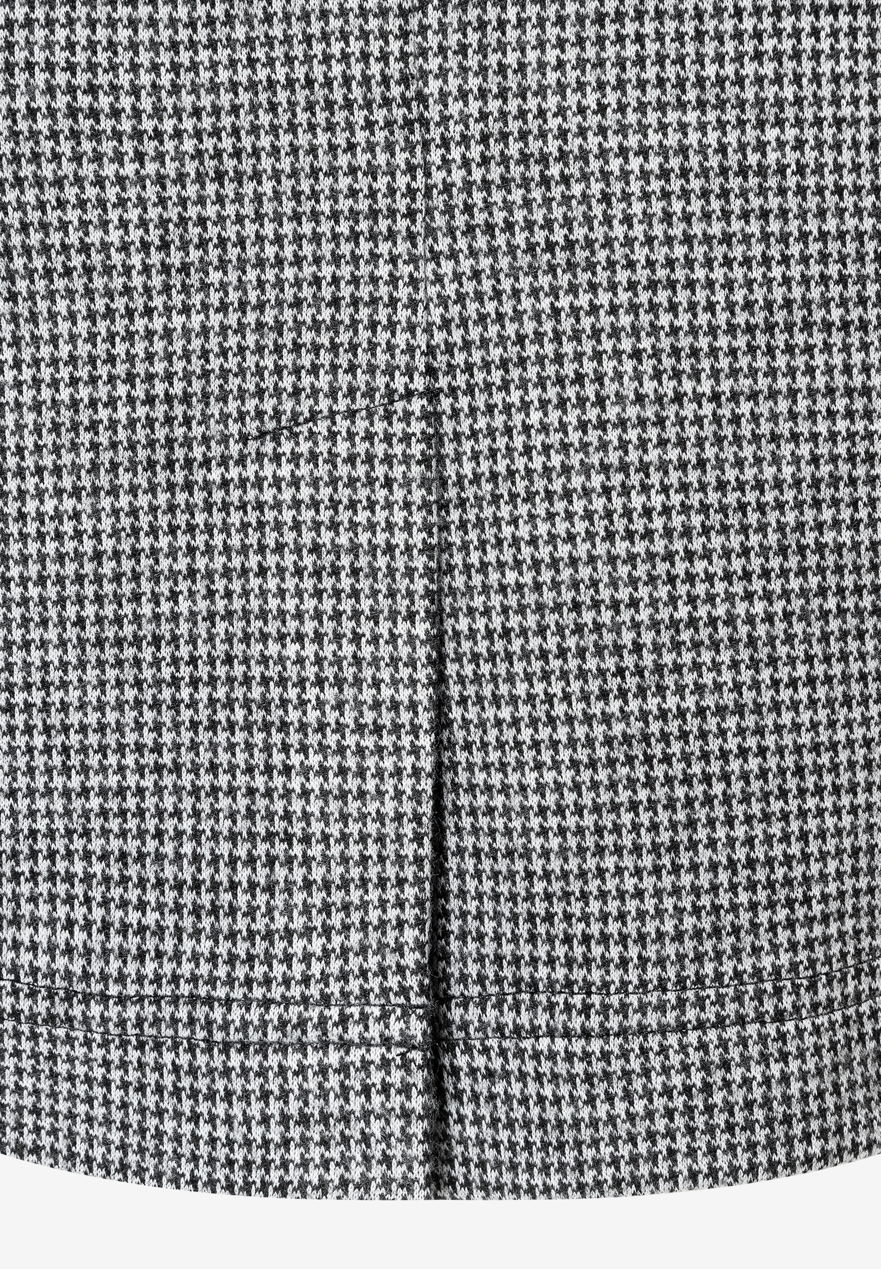 Detailansicht eines Rocks von MORE & MORE mit Hahnentrittmuster und Jersey-Material. Detailansicht eines Rocks von MORE & MORE mit Hahnentrittmuster und Jersey-Material.