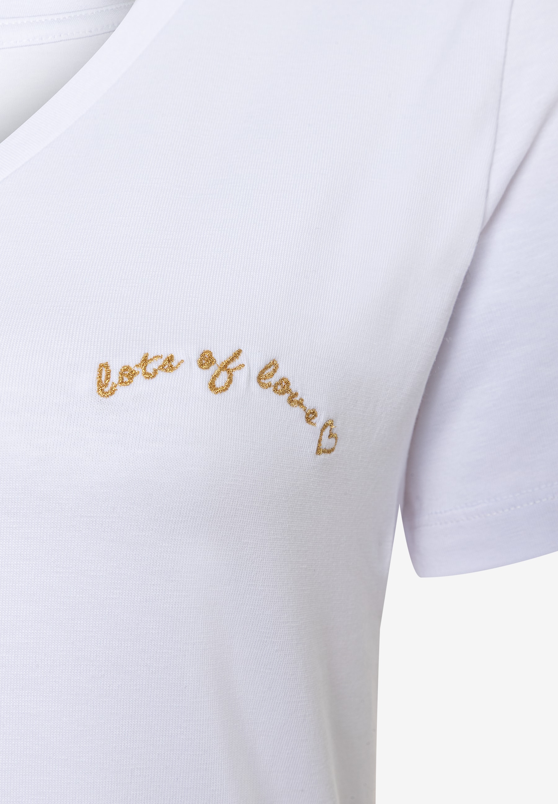 MORE & MORE weißes Jersey-T-Shirt mit goldenem „lots of love“-Stick, bequem und hautfreundlich. MORE & MORE weißes Jersey-T-Shirt mit goldenem „lots of love“-Stick, bequem und hautfreundlich.