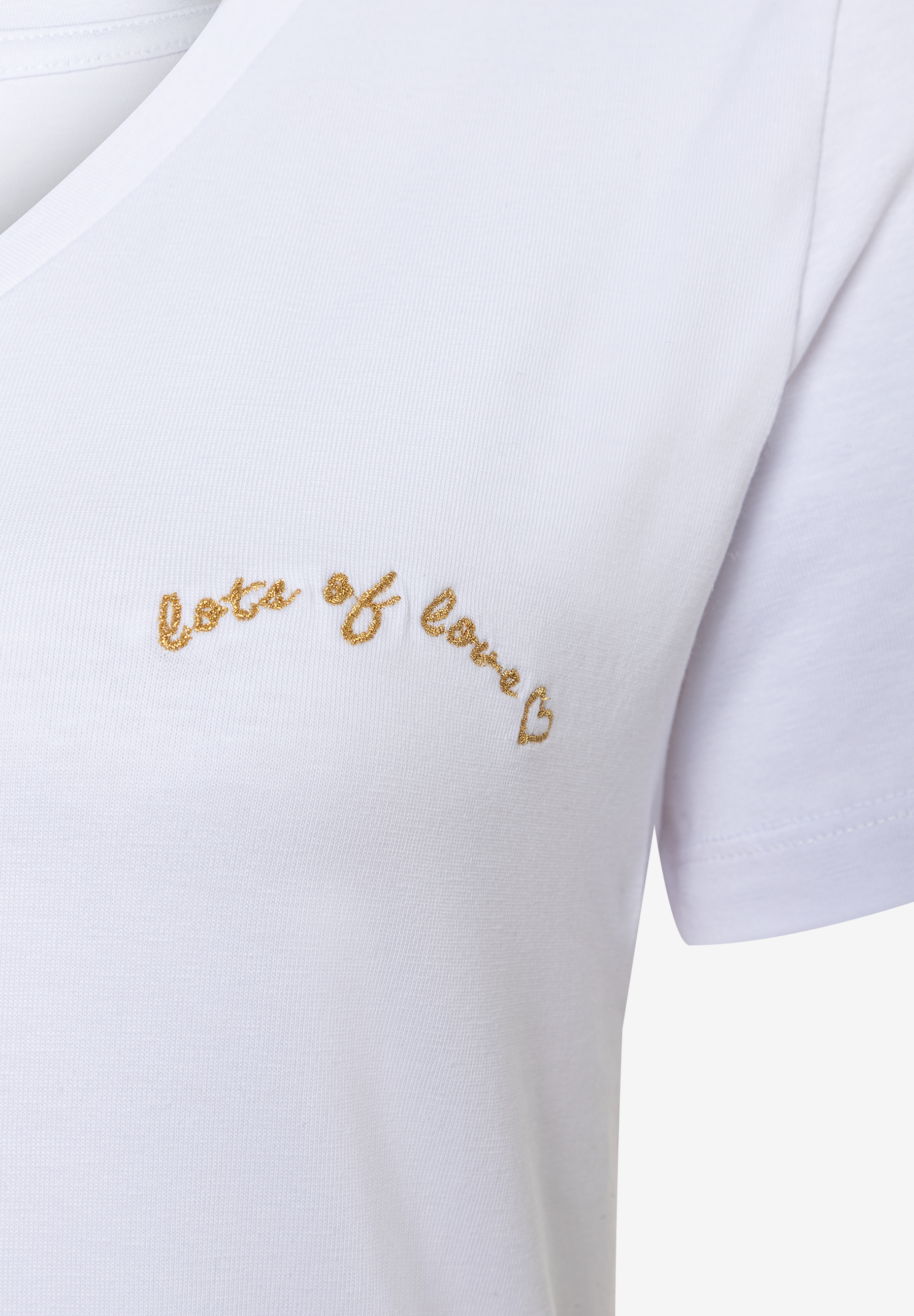 MORE & MORE weißes Jersey-T-Shirt mit goldenem „lots of love“-Stick, bequem und hautfreundlich. MORE & MORE weißes Jersey-T-Shirt mit goldenem „lots of love“-Stick, bequem und hautfreundlich.