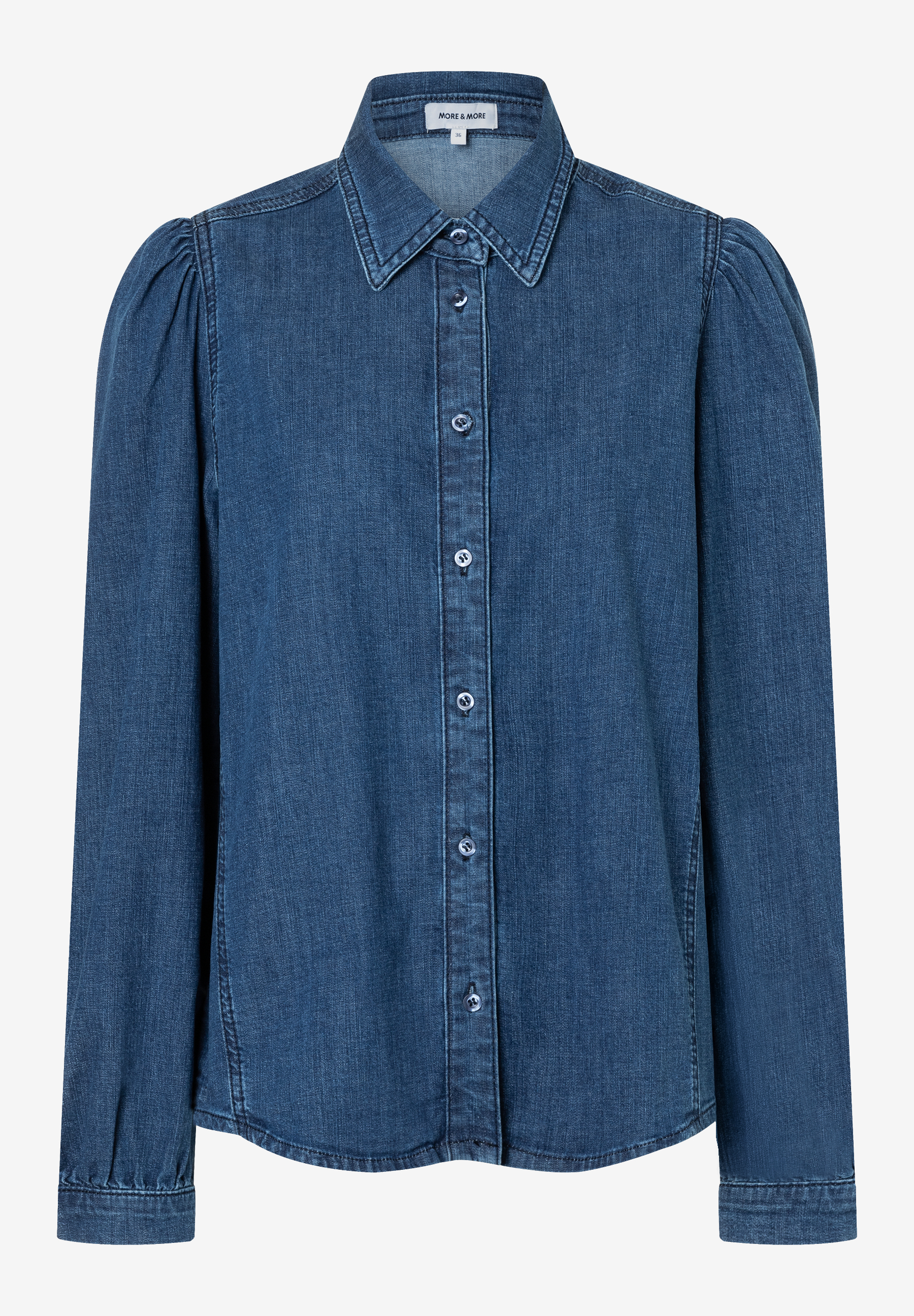 MORE & MORE Jeansbluse aus Denim. Langarm mit Schulter-Rüschen, geknöpfter Manschette. Knopfleiste und Kragen. MORE & MORE Jeansbluse aus Denim. Langarm mit Schulter-Rüschen, geknöpfter Manschette. Knopfleiste und Kragen.