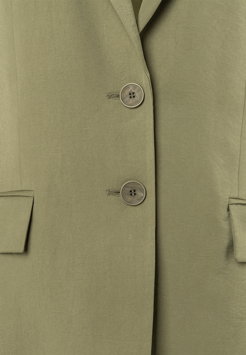 Detailaufnahme von MORE & MORE Blazer mit zwei Knöpfen. Detailaufnahme von MORE & MORE Blazer mit zwei Knöpfen.