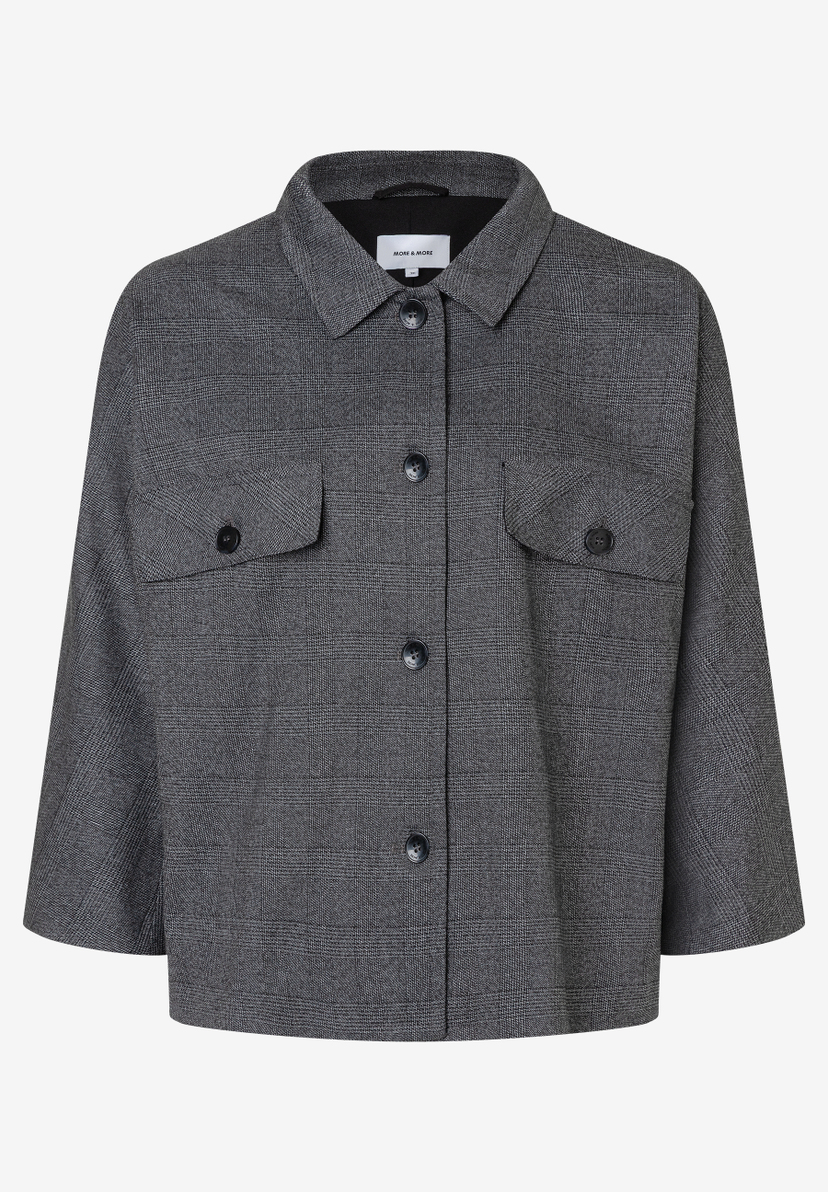 Ein karierter MORE & MORE Blazer mit Webware und drei Knöpfen. Ein karierter MORE & MORE Blazer mit Webware und drei Knöpfen.