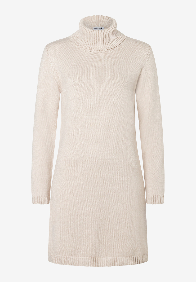 Ein beiges, geripptes Oberteil der Marke MORE & MORE mit Rollkragen und langen Ärmeln. Ein beiges, geripptes Oberteil der Marke MORE & MORE mit Rollkragen und langen Ärmeln.