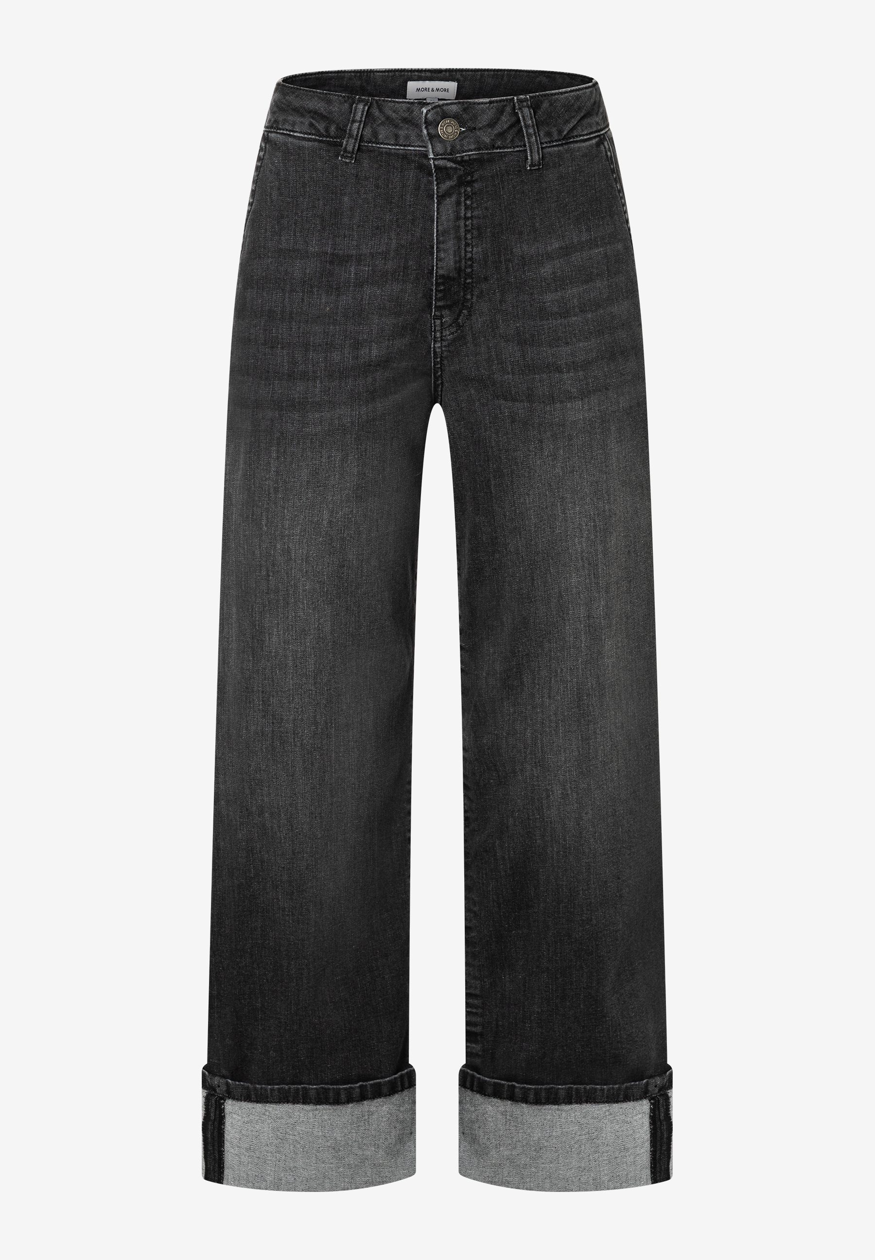 Eine MORE & MORE Jeanshose aus Denim, bequemer, elastischer Stoff, mit hochgekrempelten Hosenbeinen. Eine MORE & MORE Jeanshose aus Denim, bequemer, elastischer Stoff, mit hochgekrempelten Hosenbeinen.
