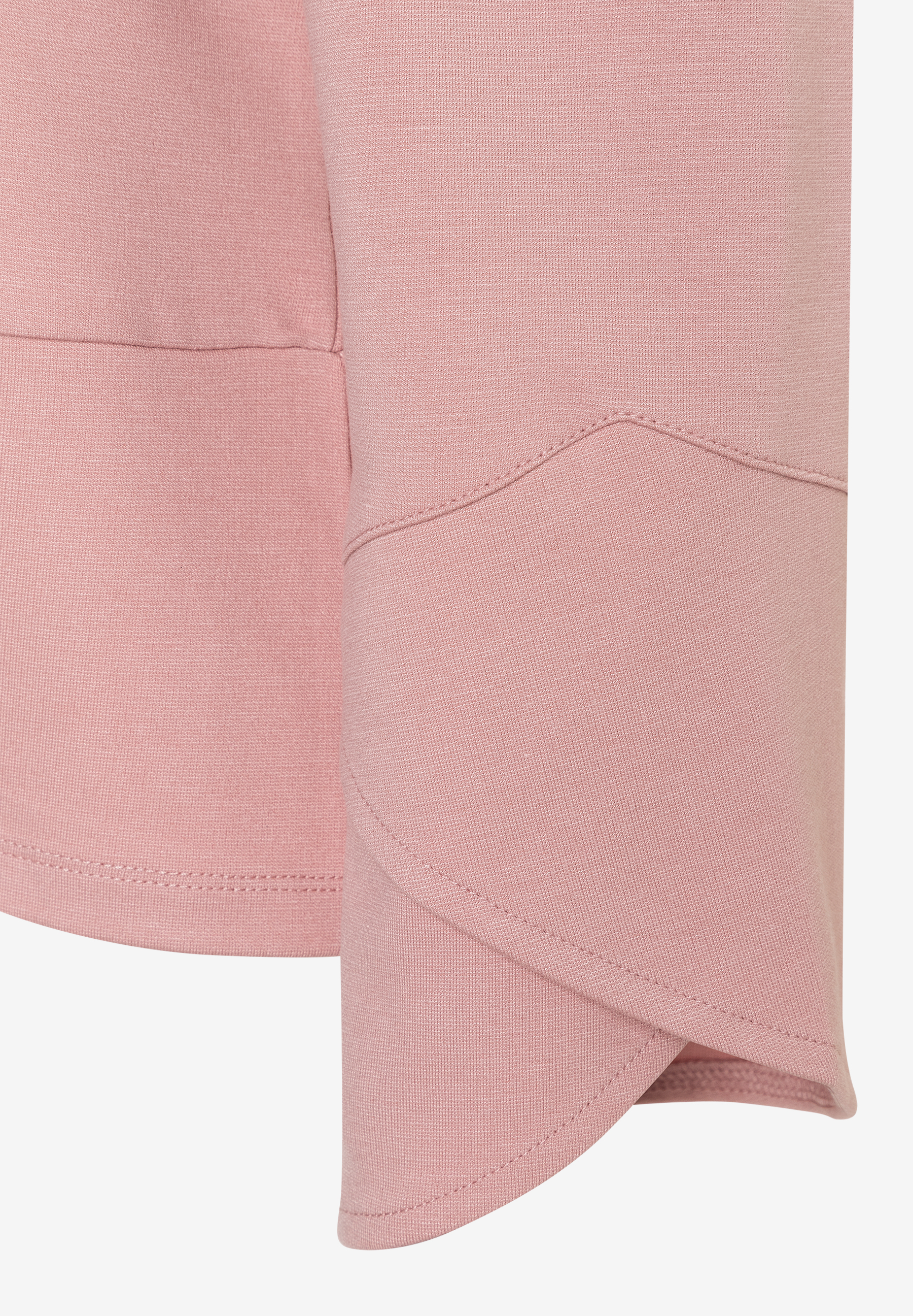 Nahaufnahme eines roséfarbenen MORE & MORE Blazers aus Jersey, der angenehm und elastisch ist. Nahaufnahme eines roséfarbenen MORE & MORE Blazers aus Jersey, der angenehm und elastisch ist.
