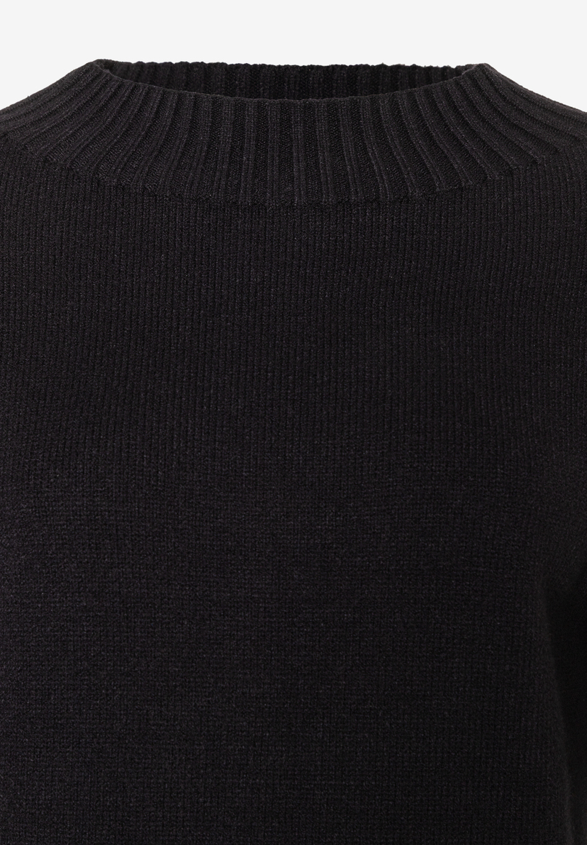 Nahaufnahme von MORE & MORE Strickware. Angenehm und elastisch. Nahaufnahme von MORE & MORE Strickware. Angenehm und elastisch.