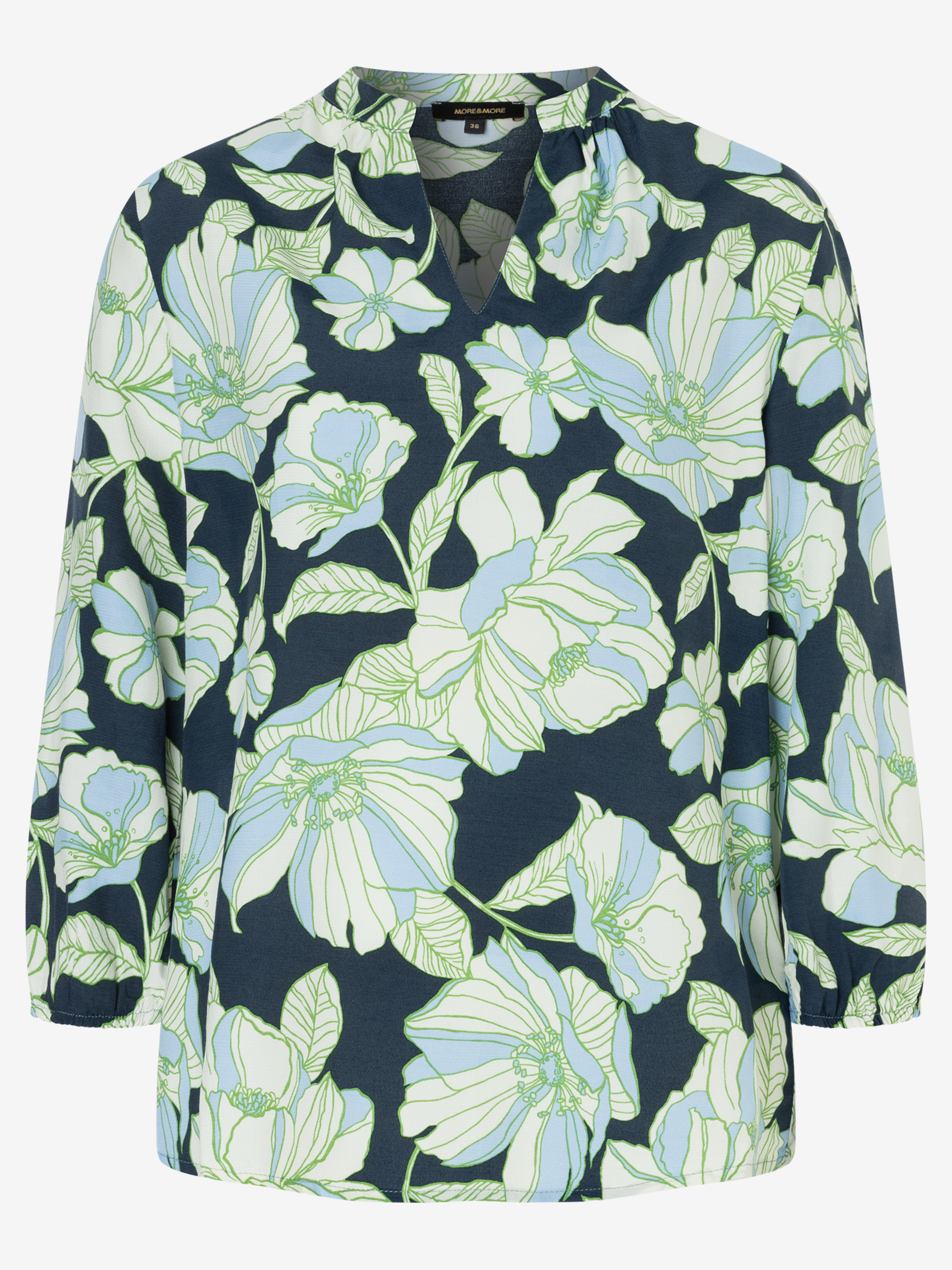 Eine MORE & MORE Bluse mit Blumenmuster in Blau und Grün. Eine MORE & MORE Bluse mit Blumenmuster in Blau und Grün.