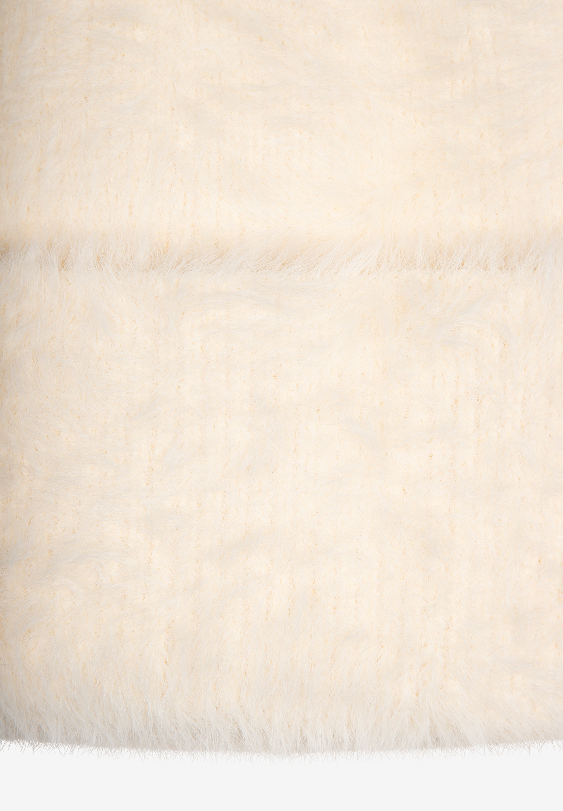 MORE & MORE Accessoire: Eine Nahaufnahme zeigt weiches, flauschiges Material in Creme- und Beigetönen. MORE & MORE Accessoire: Eine Nahaufnahme zeigt weiches, flauschiges Material in Creme- und Beigetönen.