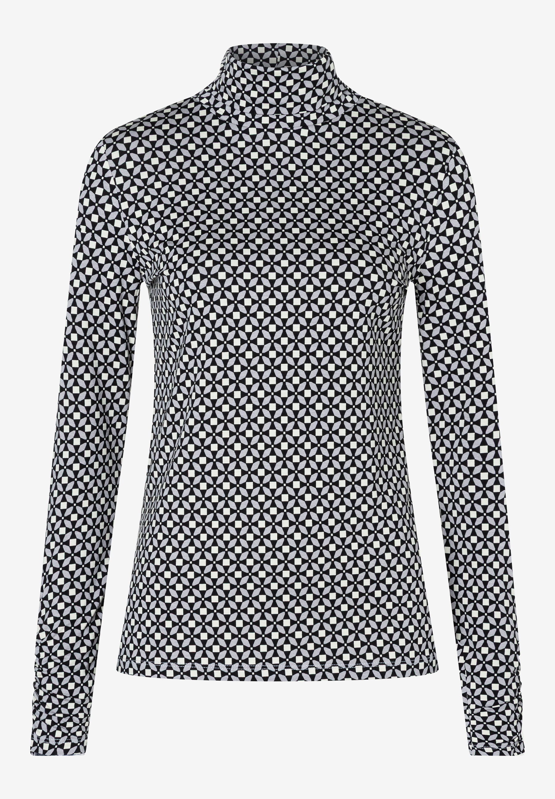 Ein MORE & MORE Oberteil mit geometrischem Muster und langen Ärmeln. Ein MORE & MORE Oberteil mit geometrischem Muster und langen Ärmeln.