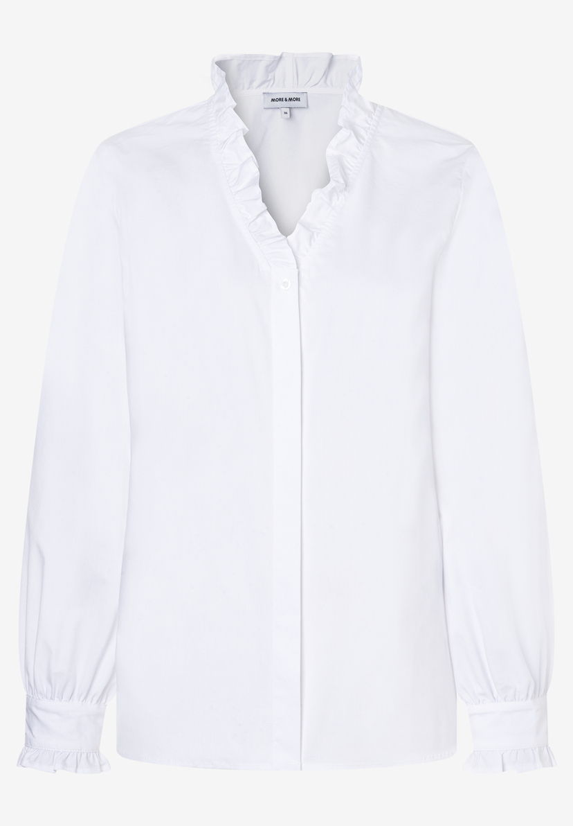 Ein MORE & MORE Bluse mit Rüschen am Kragen und Ärmeln. Ein MORE & MORE Bluse mit Rüschen am Kragen und Ärmeln.