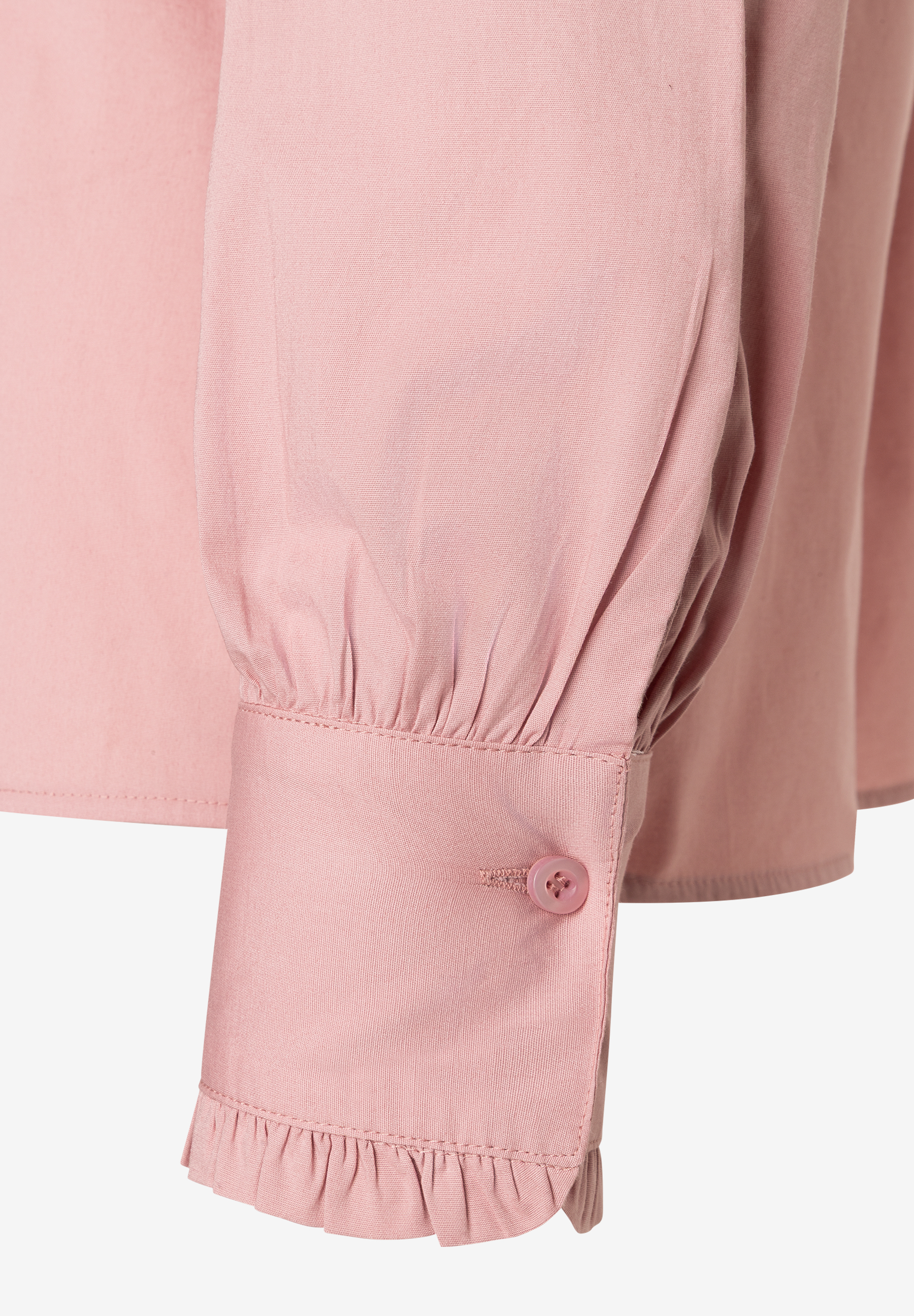 MORE & MORE Bluse: Detailansicht des Ärmels einer rosa Bluse. Der geraffte Ärmelabschluss hat einen Knopf und Rüschen. MORE & MORE Bluse: Detailansicht des Ärmels einer rosa Bluse. Der geraffte Ärmelabschluss hat einen Knopf und Rüschen.