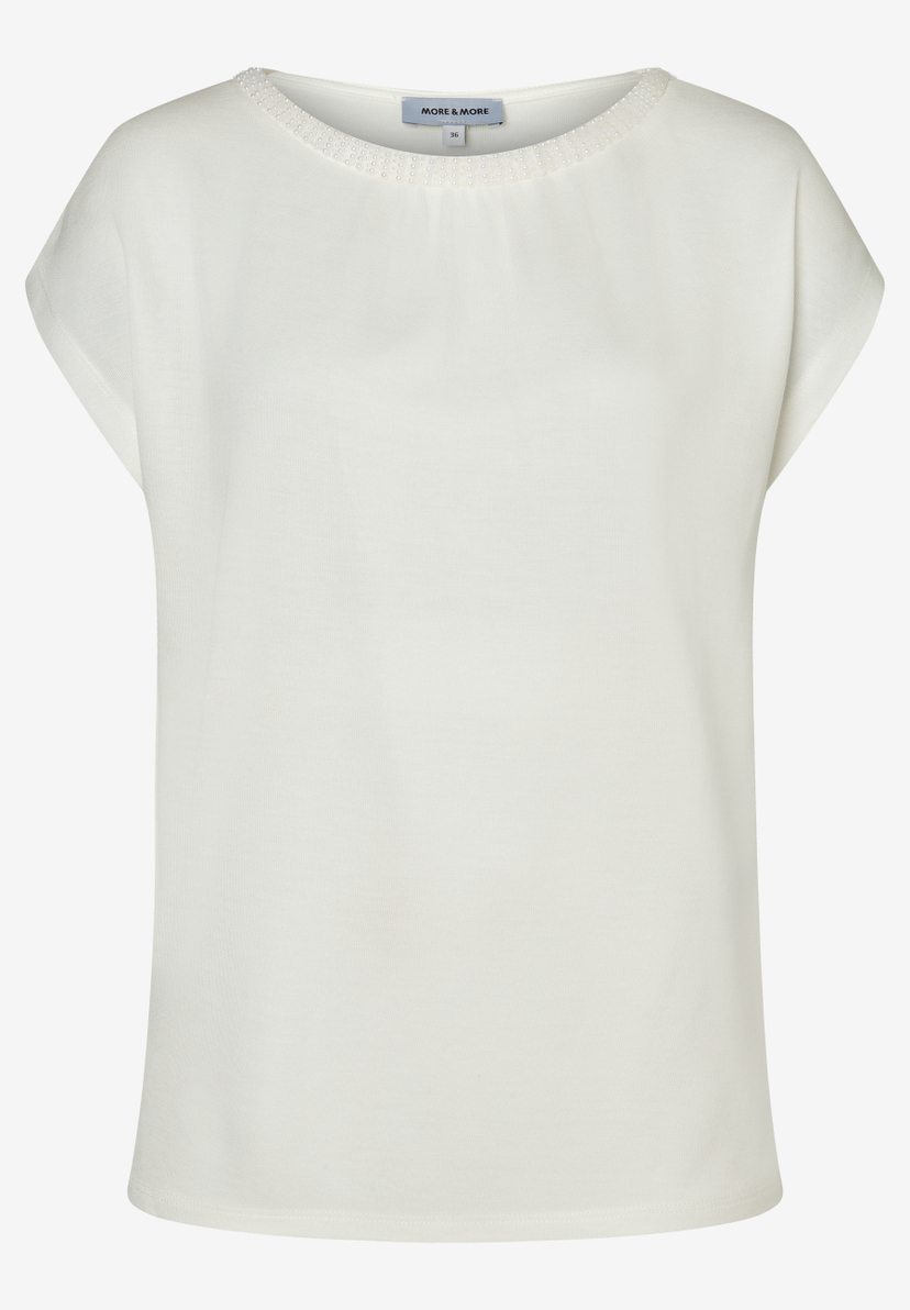 Ein weißes MORE & MORE Jersey-Top mit kurzem Arm und Perlen am Rundhals. Ein weißes MORE & MORE Jersey-Top mit kurzem Arm und Perlen am Rundhals.