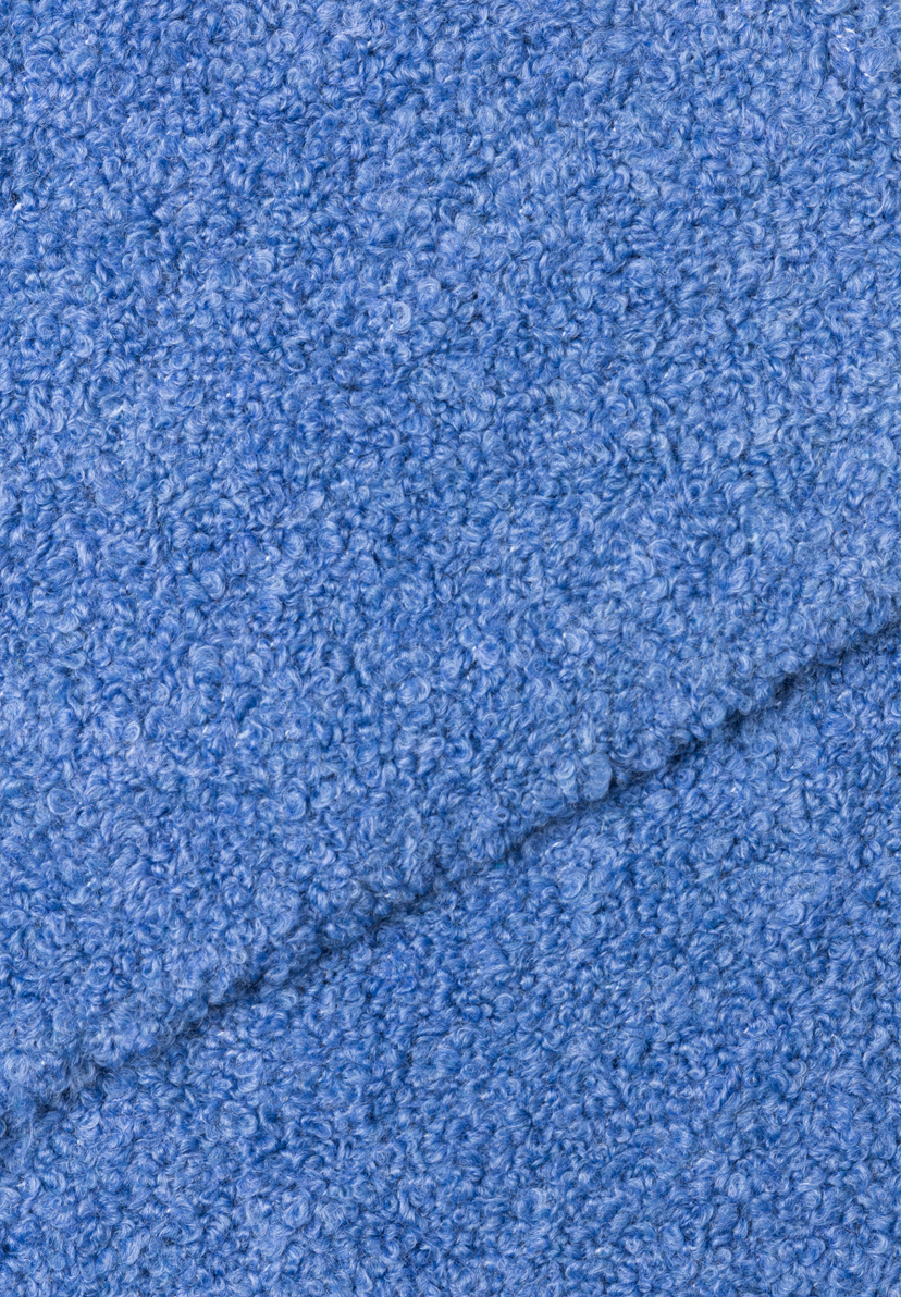 Nahaufnahme eines Accessoires von MORE & MORE, das eine blaue Textur mit Schlaufenflor zeigt. Nahaufnahme eines Accessoires von MORE & MORE, das eine blaue Textur mit Schlaufenflor zeigt.