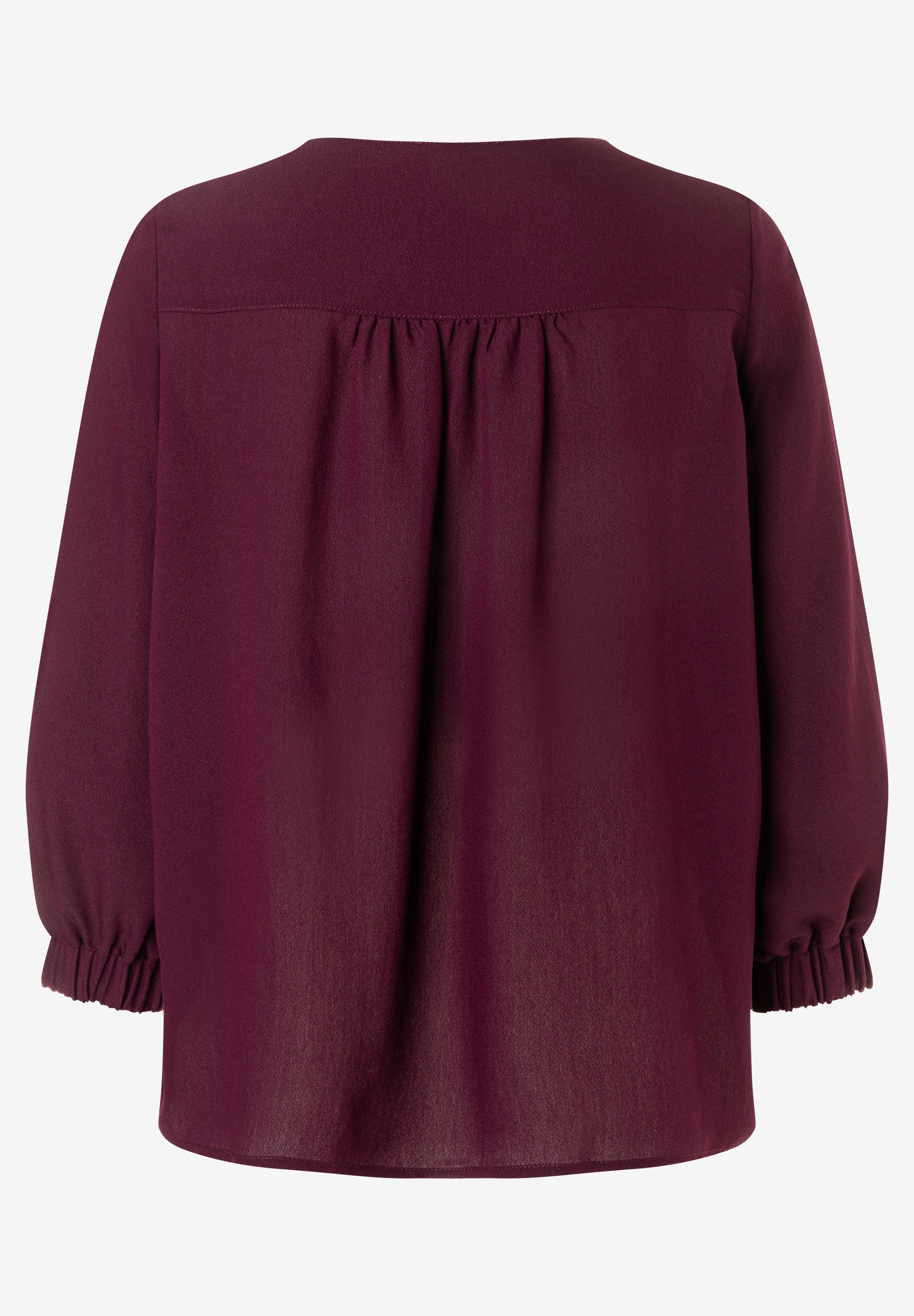 MORE & MORE Bluse in Dunkelrot, Rückansicht mit Raffung im oberen Bereich und an den Ärmelsäumen. MORE & MORE Bluse in Dunkelrot, Rückansicht mit Raffung im oberen Bereich und an den Ärmelsäumen.