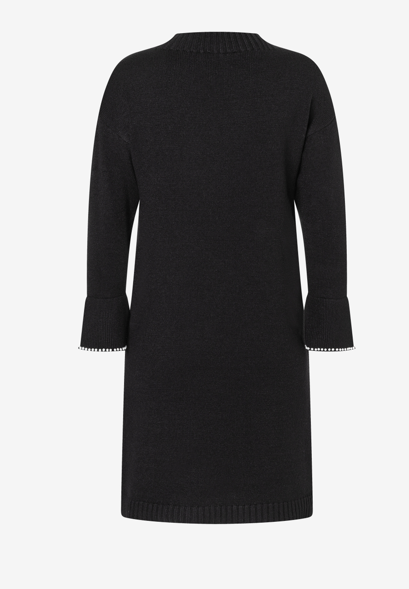 Schwarzes Strick-Oberteil von MORE & MORE mit langen Ärmeln und Perlen-Details an den Manschetten. Schwarzes Strick-Oberteil von MORE & MORE mit langen Ärmeln und Perlen-Details an den Manschetten.