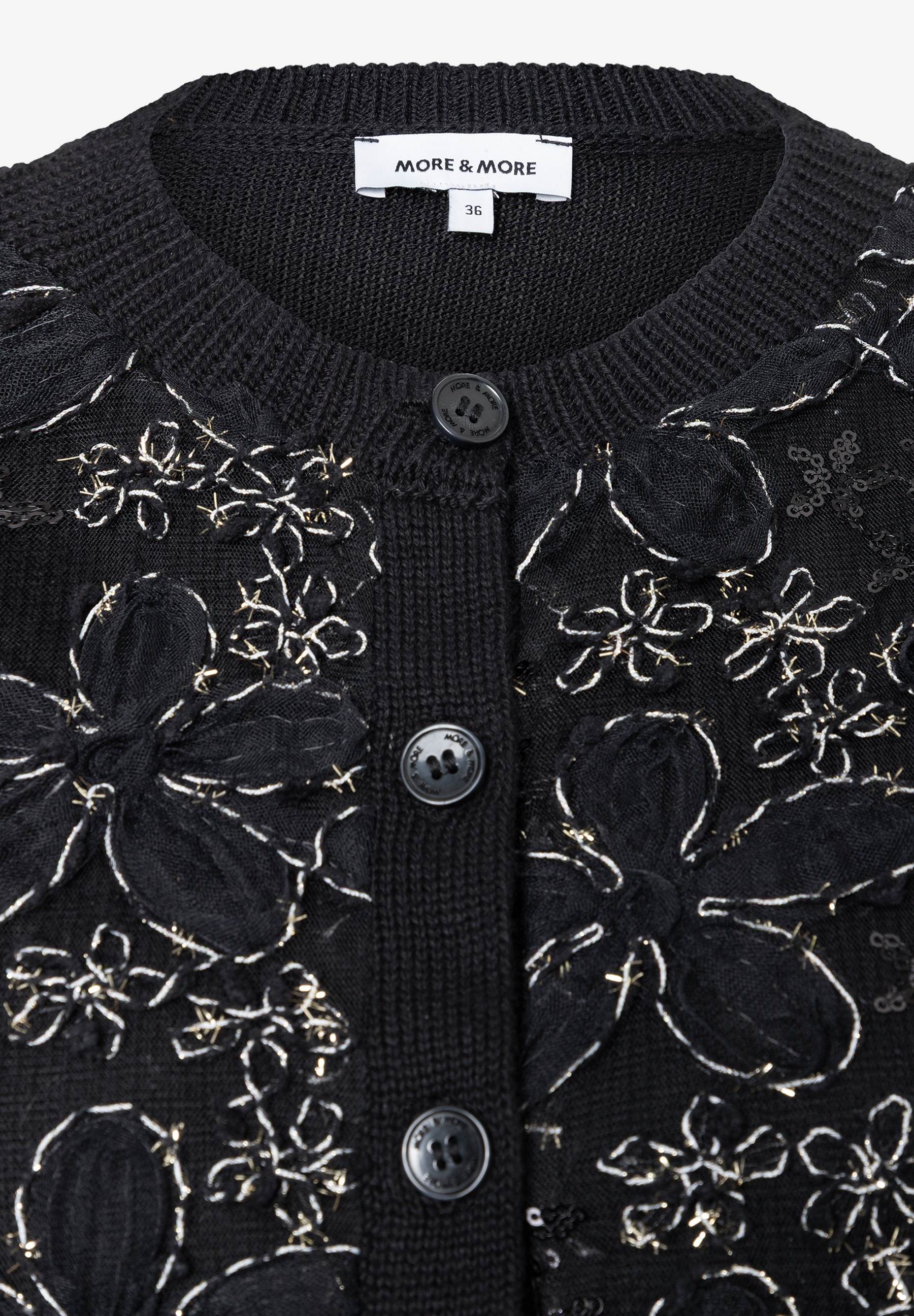 MORE & MORE schwarzer Cardigan, Pullover & Strick mit gestickten Blumen, silbernen Pailletten und goldenen Perlen.