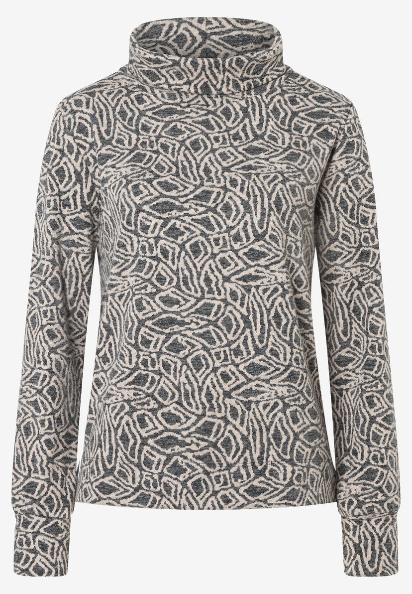 Ein MORE & MORE Jersey-Oberteil mit leichtem, weichem Stoff und abstraktem Muster. Ein MORE & MORE Jersey-Oberteil mit leichtem, weichem Stoff und abstraktem Muster.