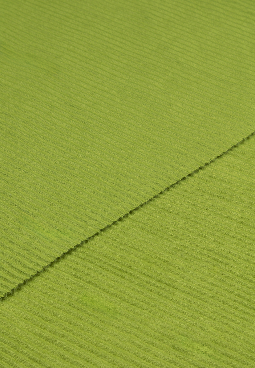 Nahaufnahme des MORE & MORE Accessoires mit feiner, grüner Rippenstruktur, die diagonal verläuft. Nahaufnahme des MORE & MORE Accessoires mit feiner, grüner Rippenstruktur, die diagonal verläuft.