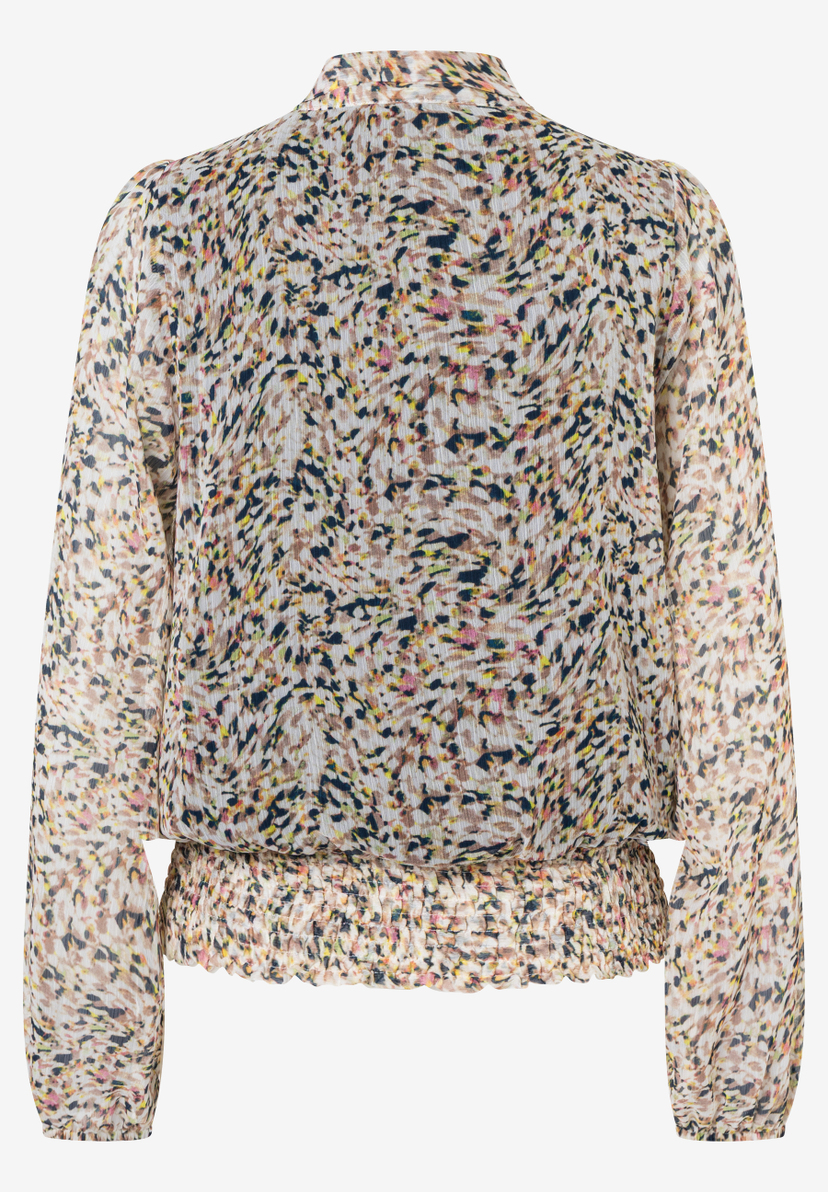 Eine MORE & MORE Bluse mit langem Ärmel und abstraktem Muster. Eine MORE & MORE Bluse mit langem Ärmel und abstraktem Muster.