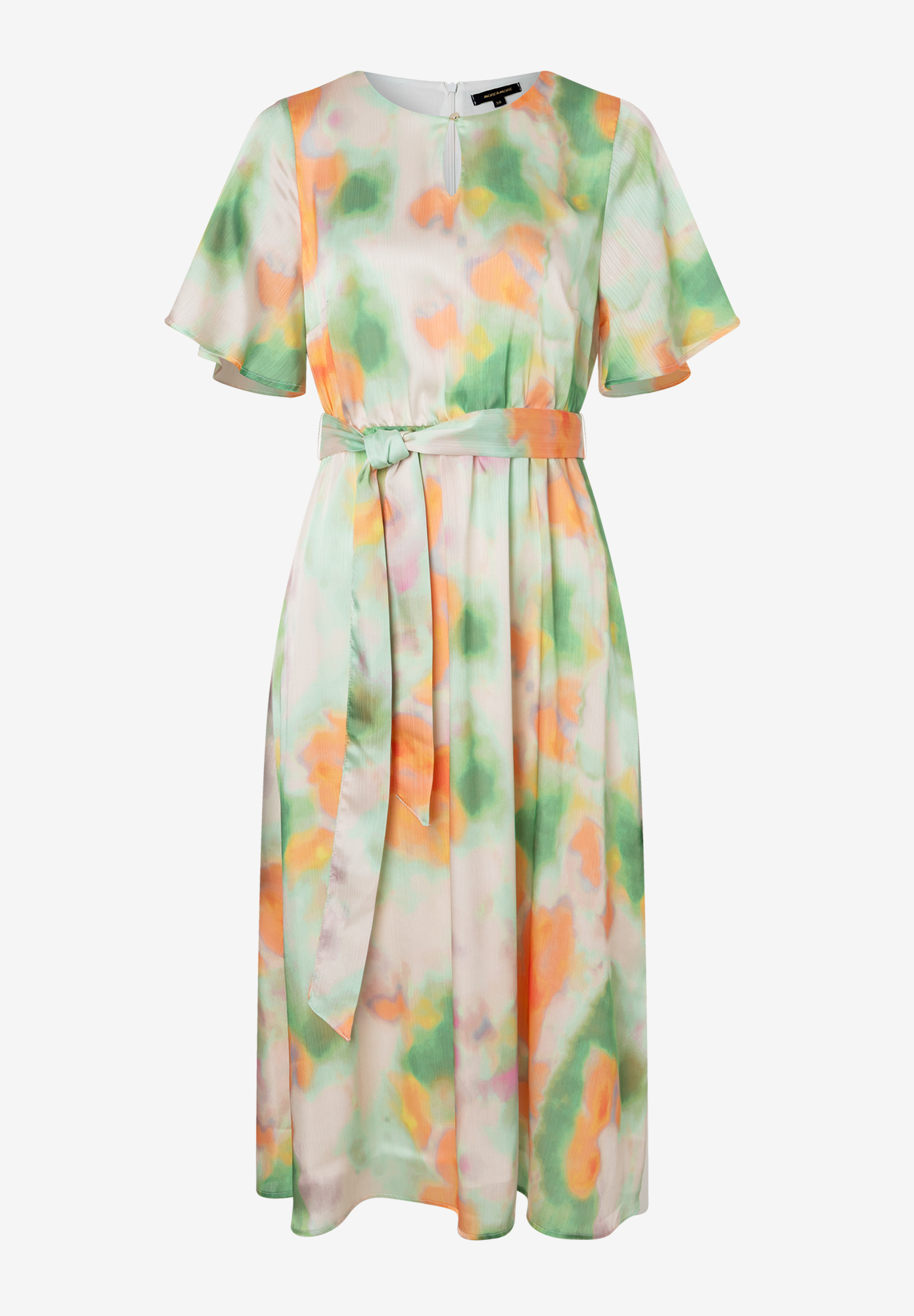 Ein Chiffon-Kleid von MORE & MORE mit abstraktem Muster und Bindegürtel. Ein Chiffon-Kleid von MORE & MORE mit abstraktem Muster und Bindegürtel.