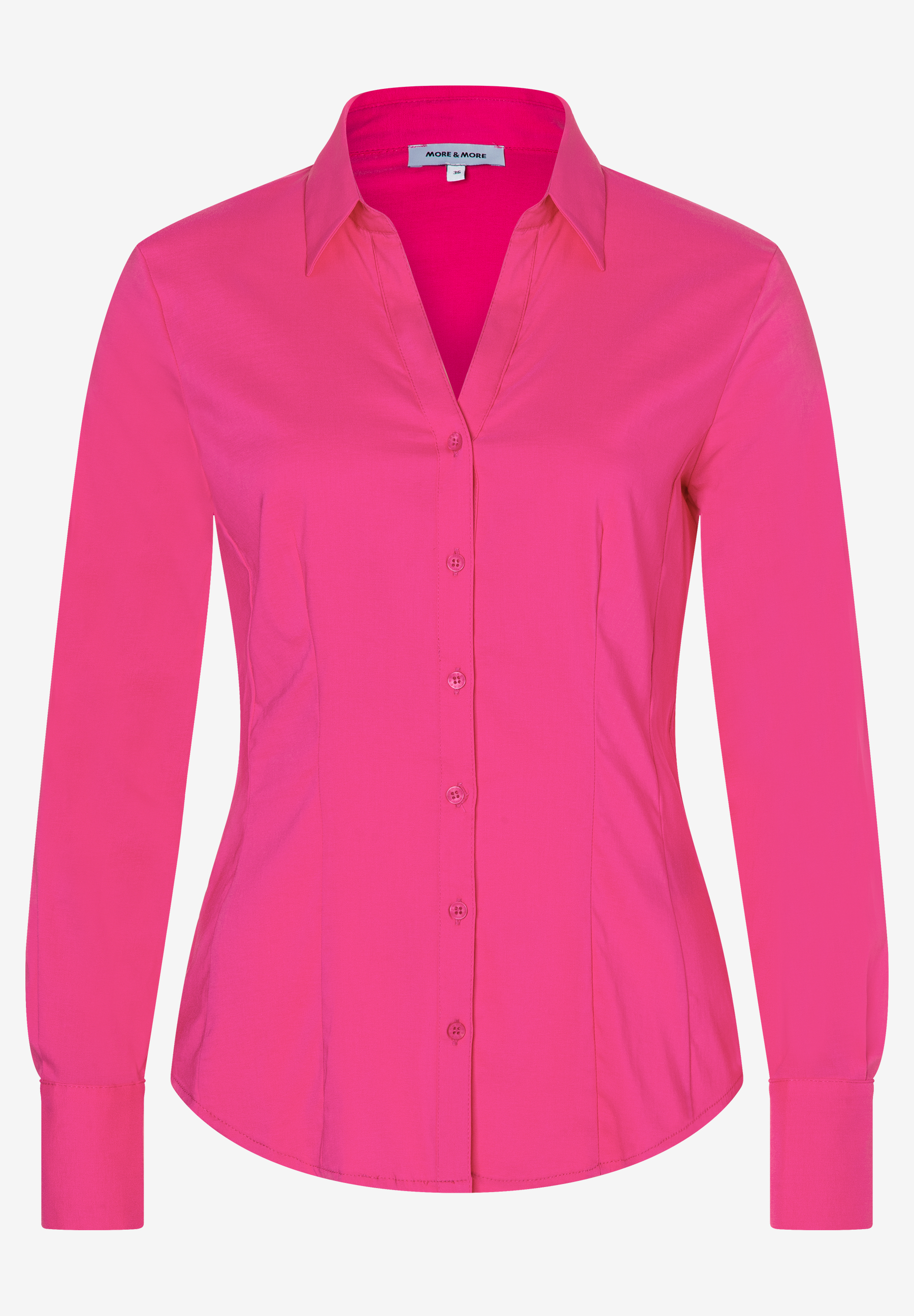 Eine pinke Bluse von MORE & MORE mit langen Ärmeln und Knopfleiste. Eine pinke Bluse von MORE & MORE mit langen Ärmeln und Knopfleiste.